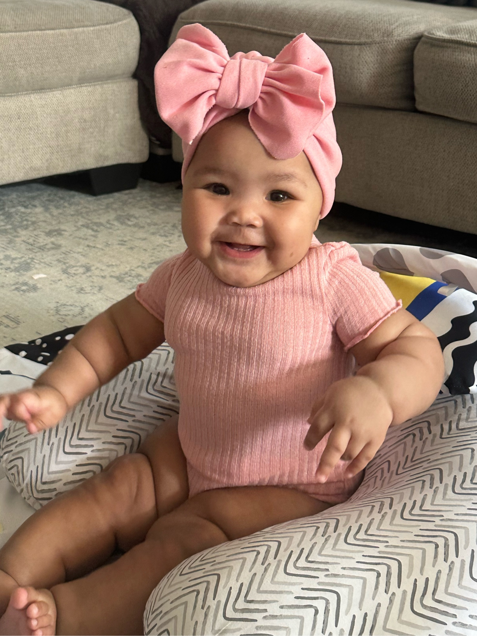sitting perfect in pink 🎀 super cute bow hat with the matching pink onesie🥹 

#LTKFamily #LTKBaby #LTKKids