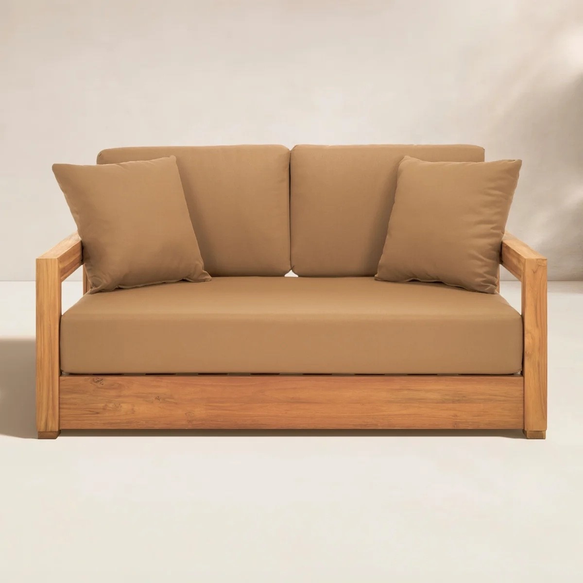 This outdoor loveseat from Wayfair has such a warm, relaxed look with its natural wood frame and camel-brown cushions. I love the clean square arms, deep seat, and matching throw pillows for a patio, balcony, or backyard lounge setup. It’s included in Wayfair’s 48-Hour Clearance and is currently marked 28% off. #WayfairFinds #OutdoorLoveseat #PatioFurniture #OutdoorLiving