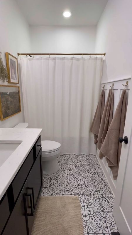 guest bathroom refresh 🤍✨ gold bathroom accents | wall art | guest bathroom decor | neutral home decor

#LTKstyletip #LTKhome #LTKfamily