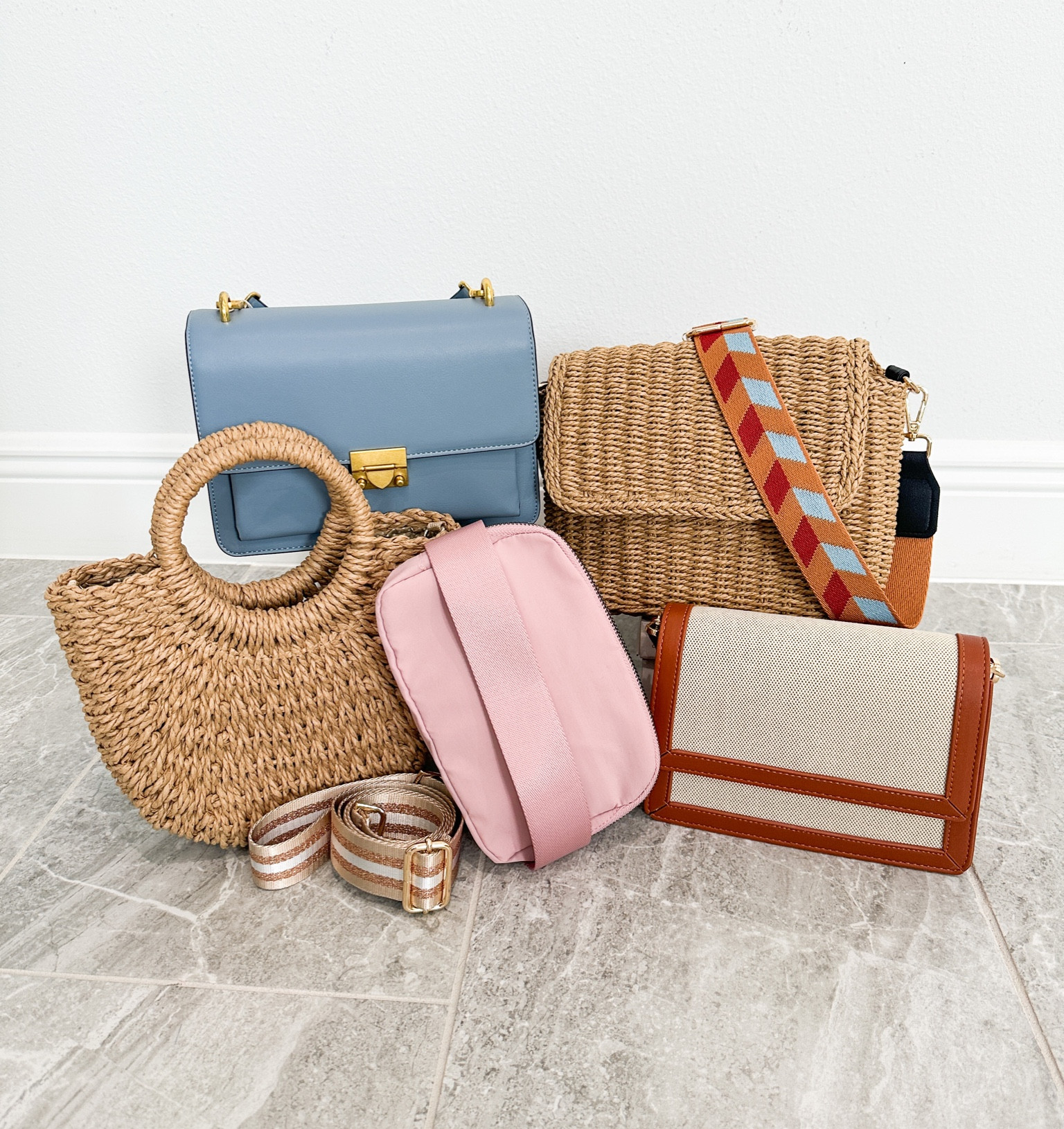 Spring Purse refresh from Amazon! Blue and brown/tan purse come with two strap options. Pink belt bag is the right shade to go with everything! Straw crossbody you can change out the strap to match your outfit! 

#LTKFind #LTKunder50 #LTKstyletip