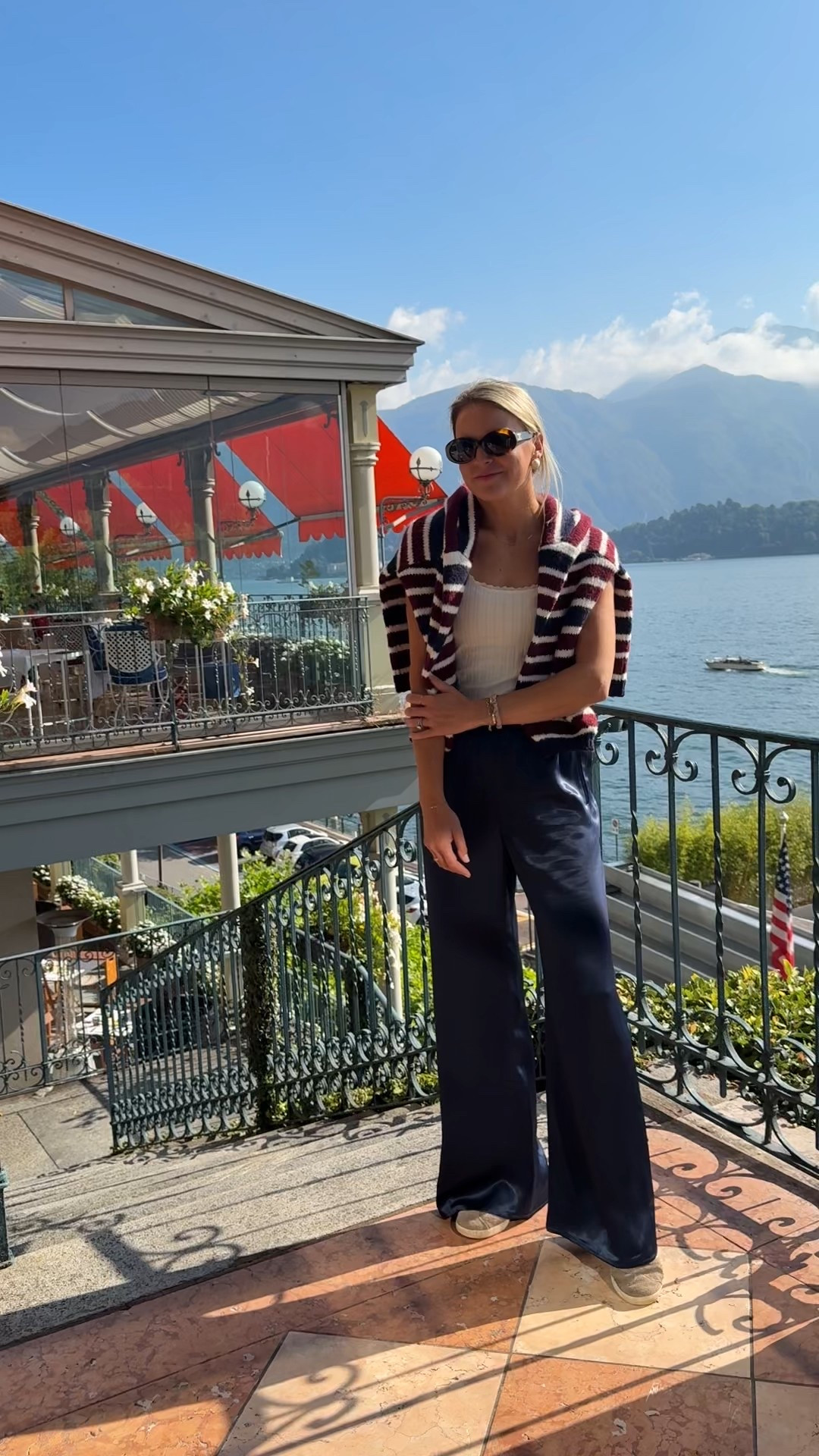Day 2 Lake Como outfit for exploring and a boat ride. 🛥️ 🌊 
•XS in pants
•sized up 1 to medium in sweater 
•small tank
•size down 1 full size in sneakers 

#LTKTravel #LTKFindsUnder100