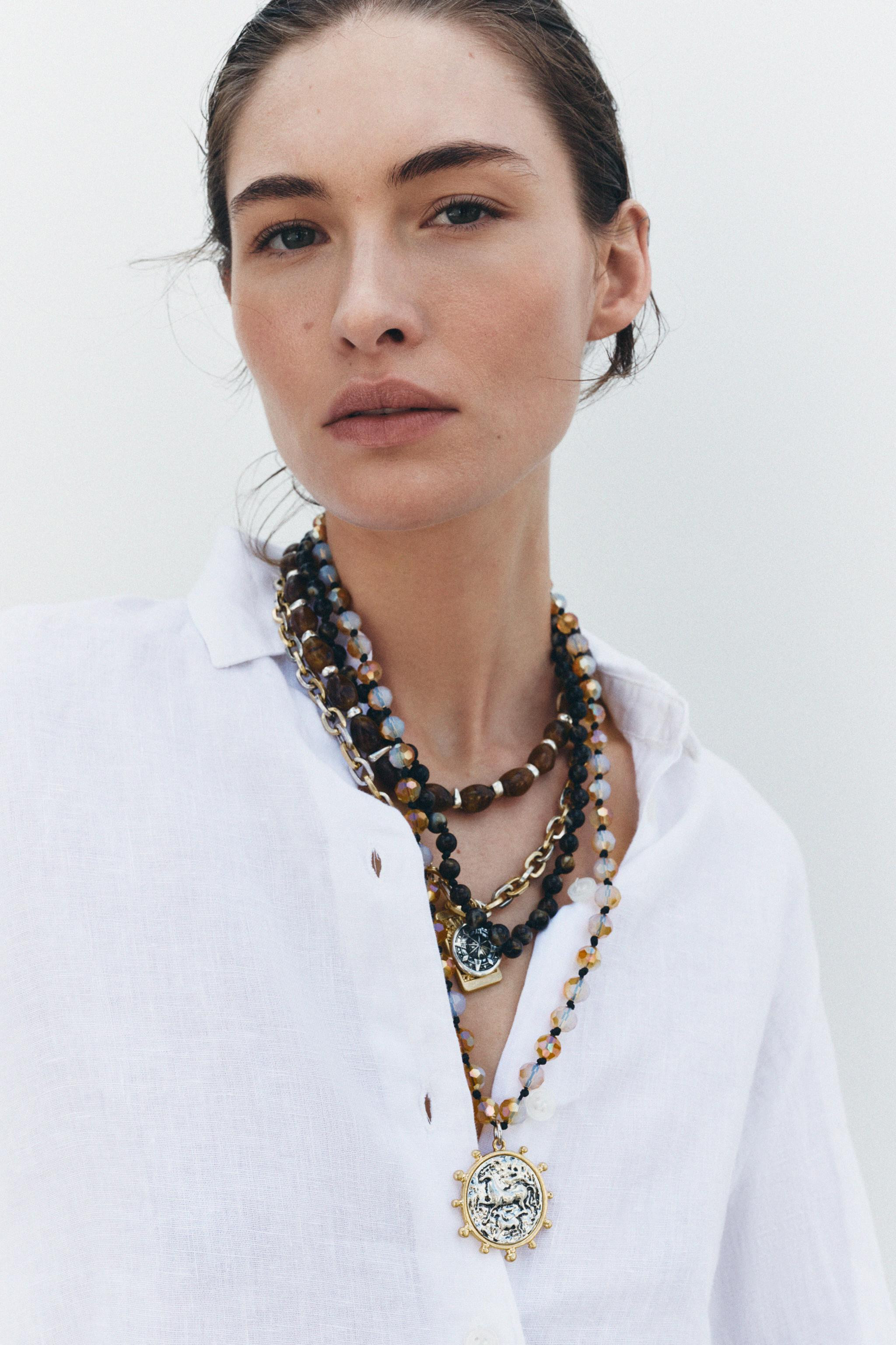 Pack of four necklaces in different lengths:- Necklace combining colored oval pieces and metal pi... | Zara US