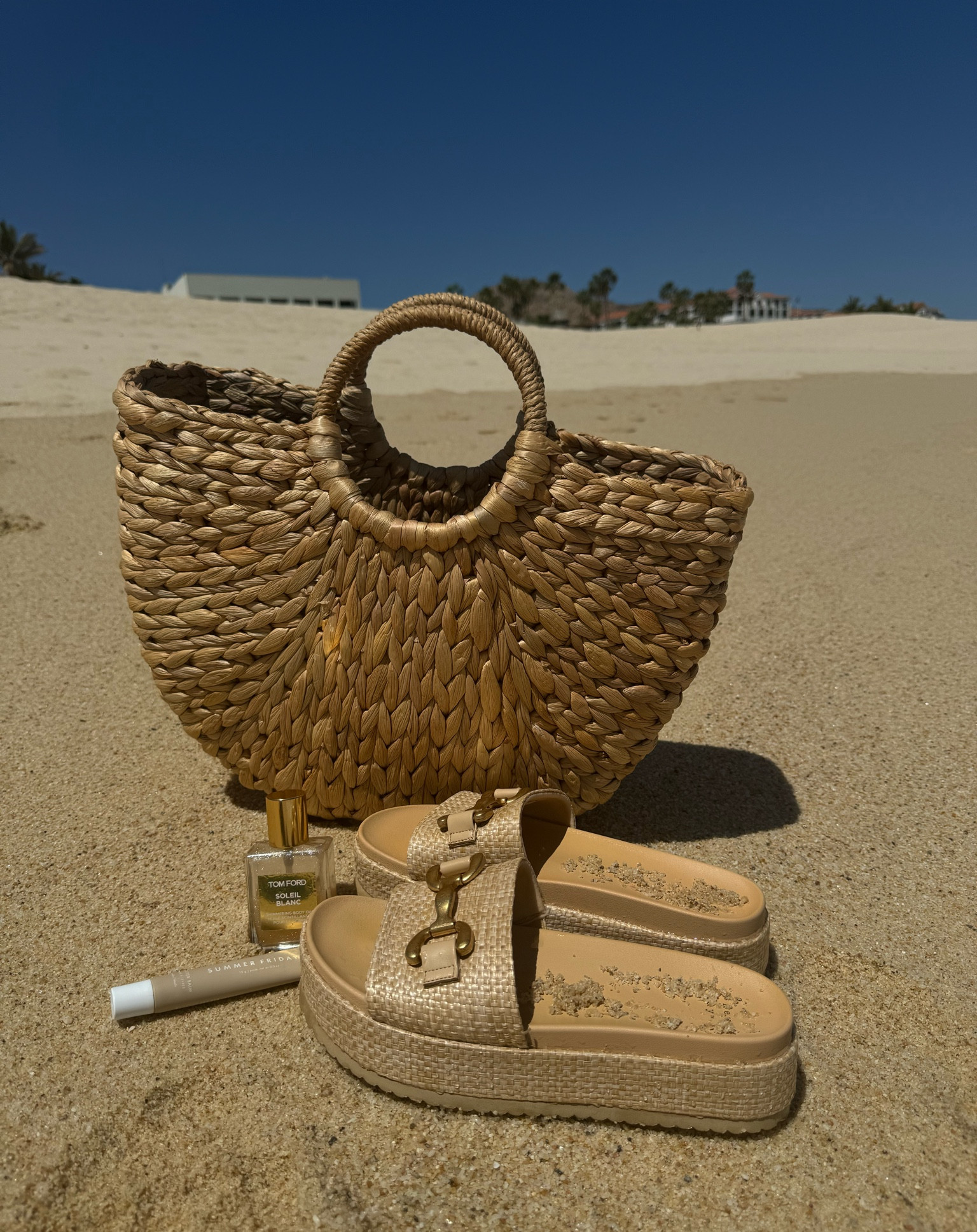 Vacation Essentials. You can never go wrong with a juicy lip balm, fragrant shimmering body oil, comfy & cute sandals, and a spacious purse to match ✨

#LTKtravel #LTKswim