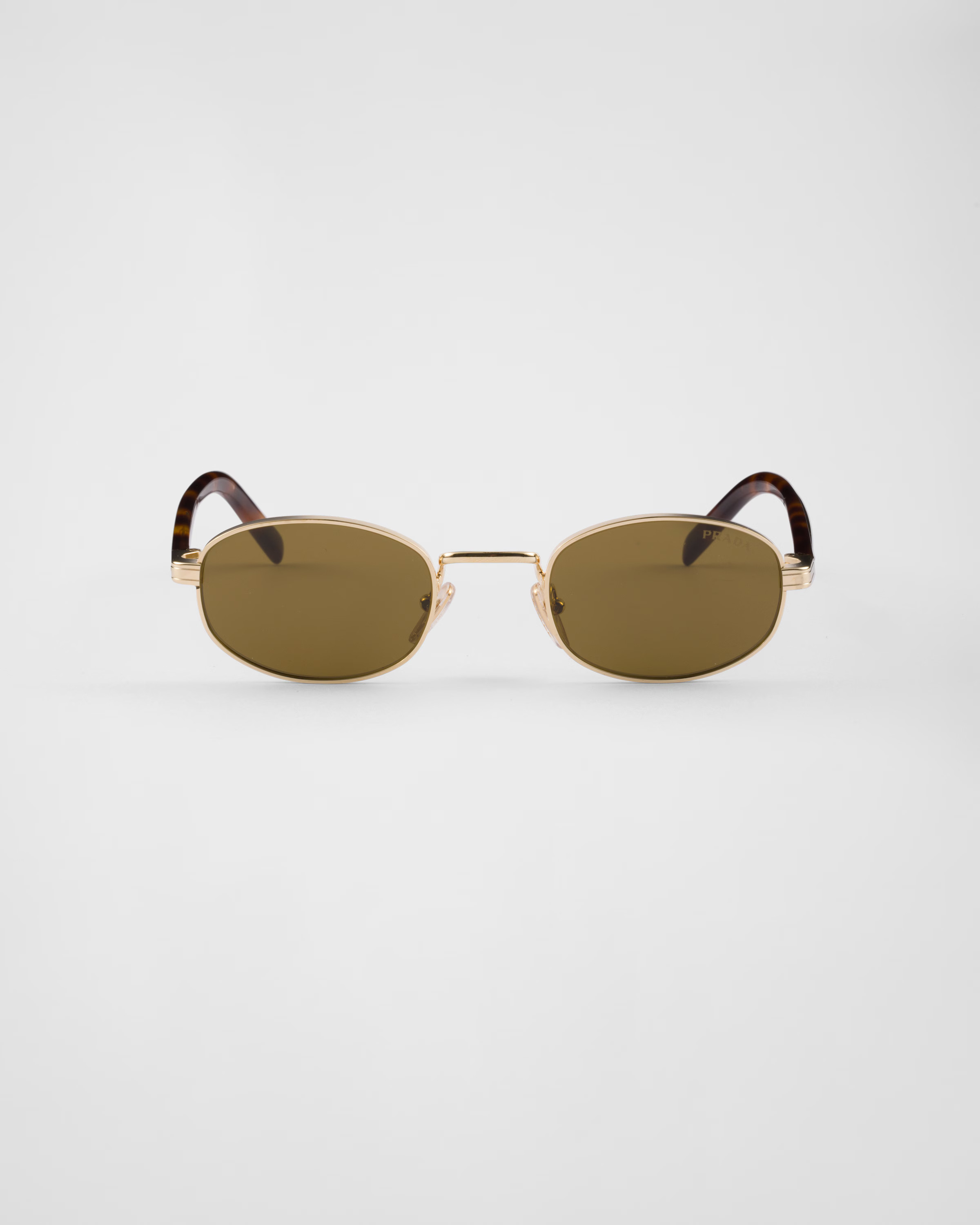 Sunglasses with the iconic metal plaque | Prada US