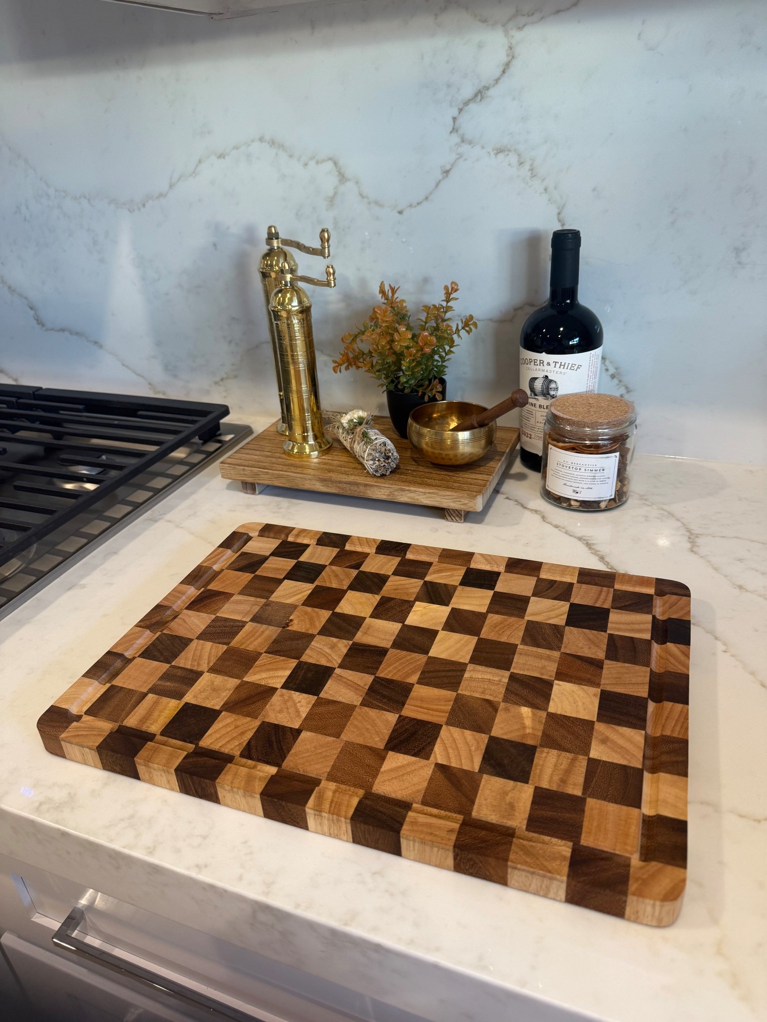 There’s just something about natural wood tones against marble that makes a kitchen feel warm and elevated 🤎 This cutting board is both functional and beautiful…perfect for prep or display

#LTKGiftGuide #LTKSaleAlert #LTKHome