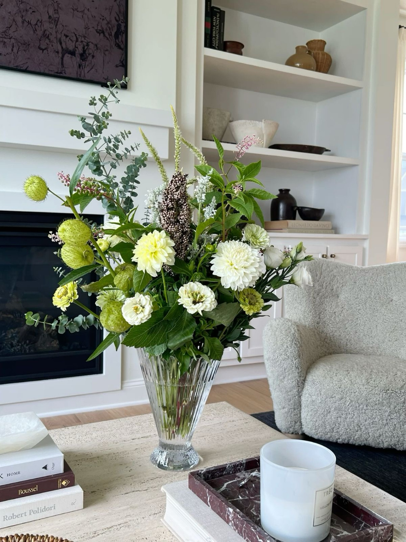 A small glimpse into my living room
 🤍

Built ins, fresh flowers, bright interiors, home, home decor, interior design, interior decorating, bright interiors, luxury interiors, living room, family room, shearling chair, crate and barrel, travertine, marble

#LTKFindsUnder100 #LTKHome #LTKSaleAlert