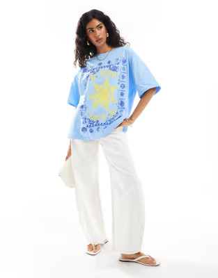 ASOS DESIGN oversized t-shirt with la plage graphic in white | ASOS (Global)
