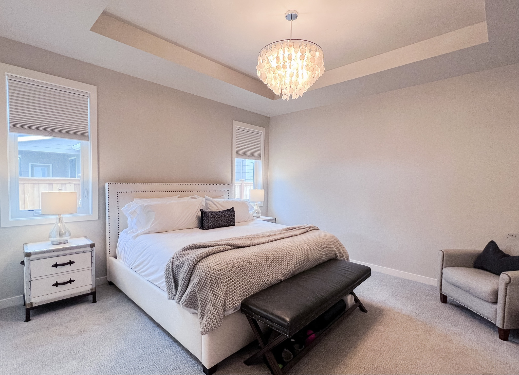 Master bedroom style. Master bed king bed frame. Upholstered bed frame. Chunky knit throw blanket. End of bed bench. Capiz chandelier. #capiz #upholsteredbedfrsme #bedframe

#LTKfamily #LTKstyletip #LTKhome