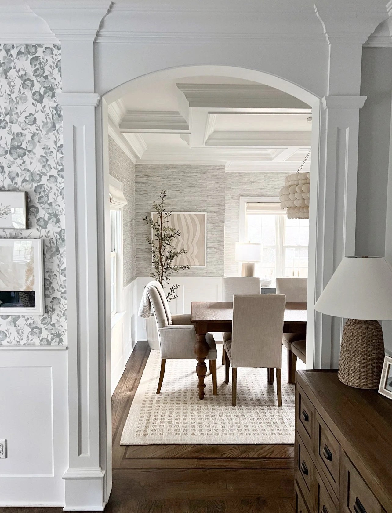 The mix of warm wood, soft neutrals, and layered texture makes this dining room feel so inviting. The upholstered dining chairs, patterned rug, woven lighting, and grasscloth wallpaper bring in just enough detail while keeping everything light.

dining room decor, dining room furniture, upholstered dining chairs, dining room rug, woven pendant light, grasscloth wallpaper, neutral home decor, dining room inspiration, traditional home style, girlonthehudson

#LTKHome #LTKSeasonal #LTKdayinmylife