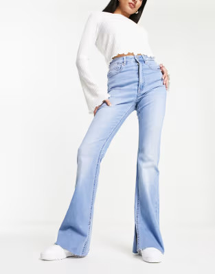 Stradivarius flare jean with side split in light blue | ASOS (Global)