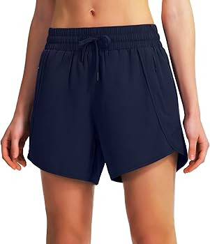 Ksmien Women's 5"/ 7" Athletic Running Shorts Quick Dry Lightweight Workout Gym Shorts with Zippe... | Amazon (US)