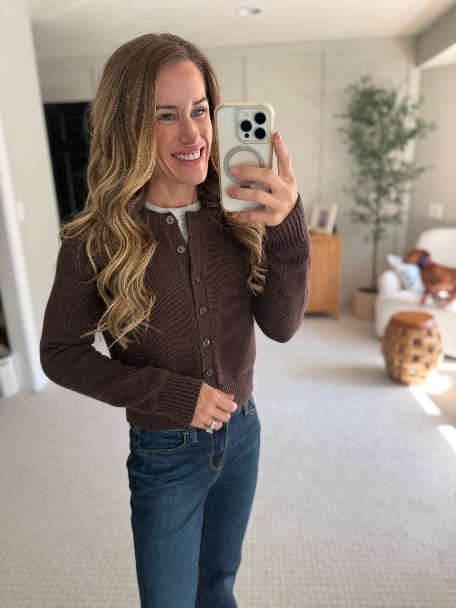 Outfit check: a cozy brown top and jeans feel right for the season. Layering this simple staple keeps mornings easy.