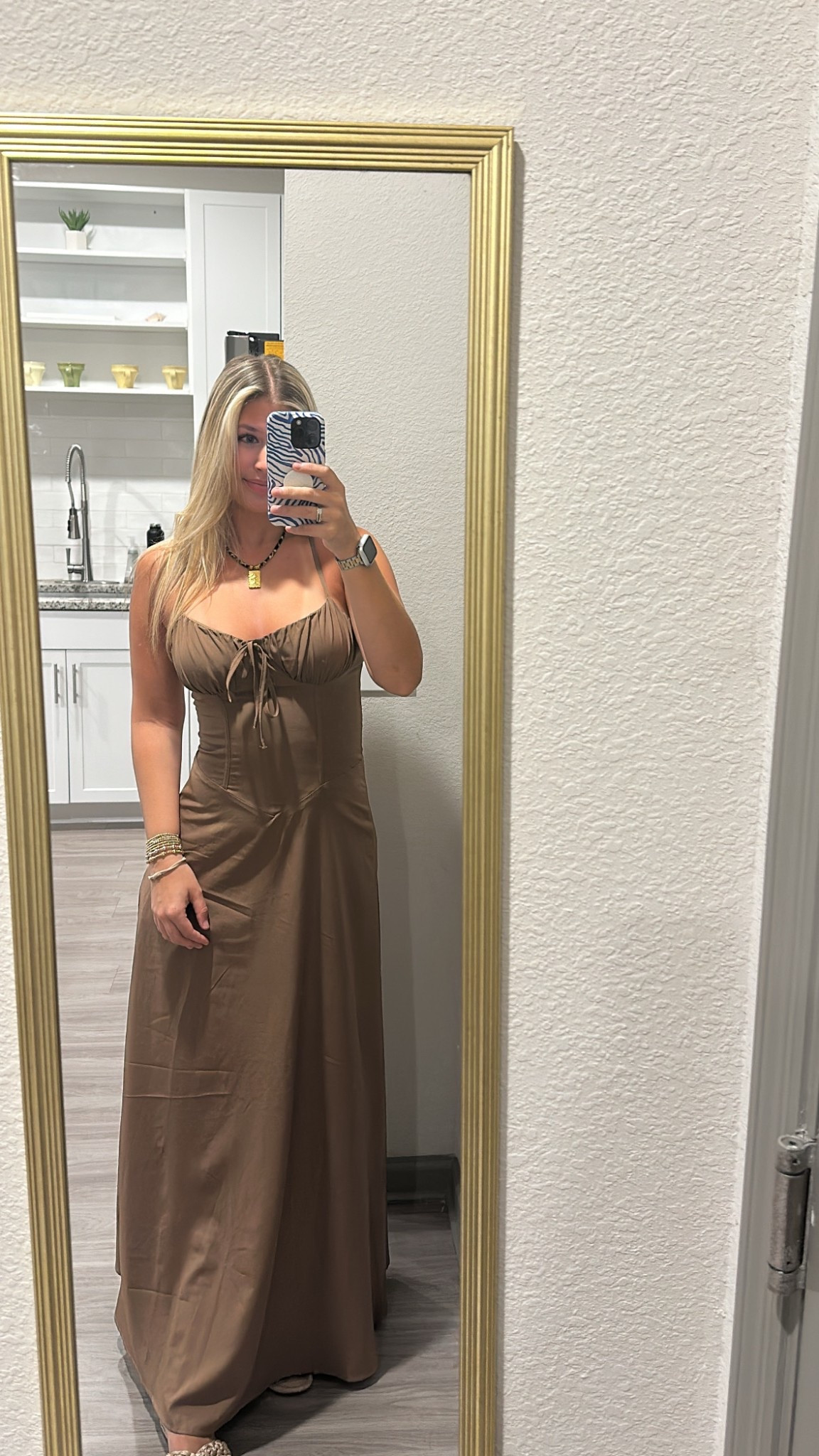 This brown maxi dress is affordable and perfect for spring and summer! 

#LTKSeasonal #LTKWorkwear #LTKFindsUnder50