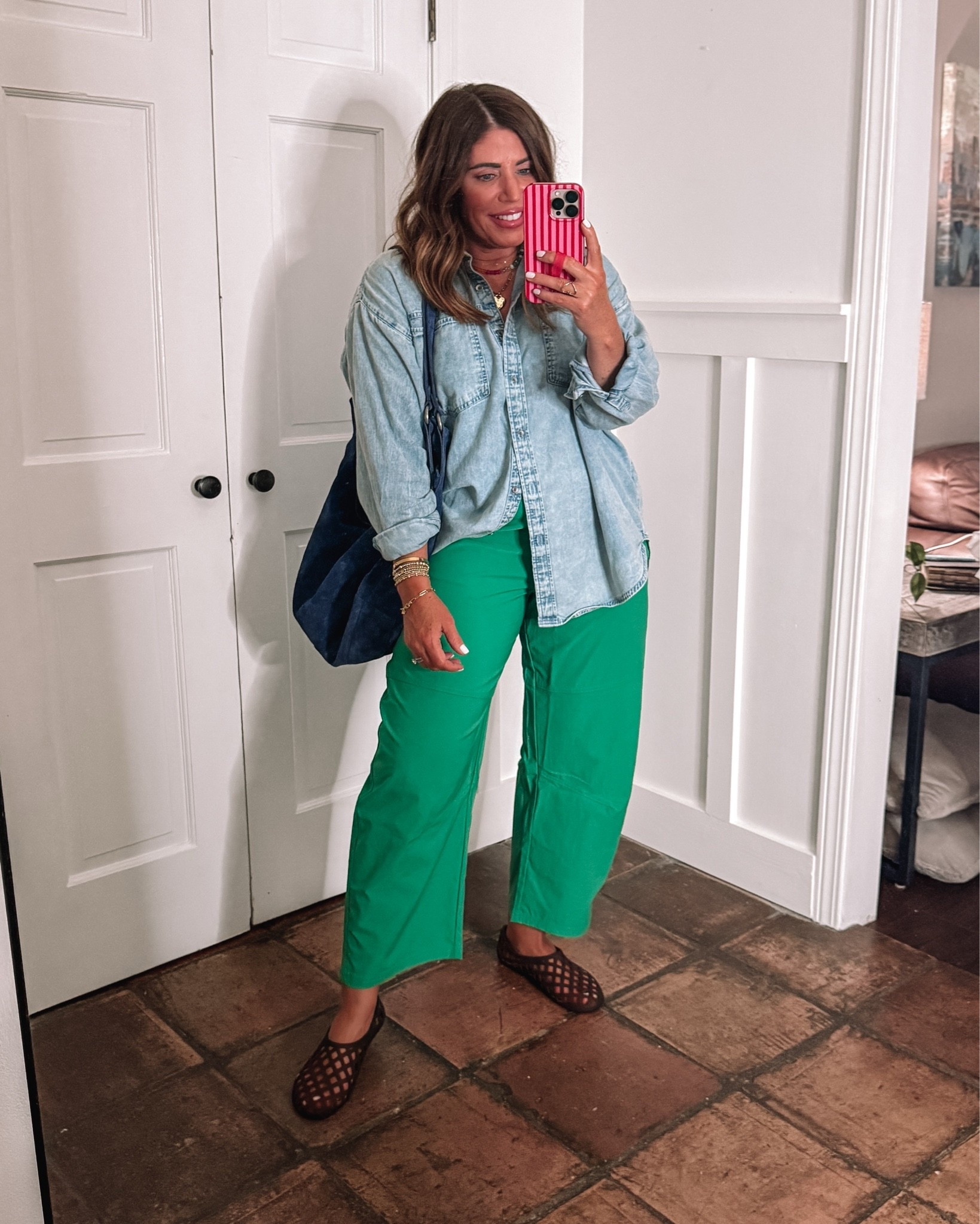 Laid back, chill & comfy with pops of color!

I love the subtle barrel leg of these pants. I’m wearing a medium long. They’re so comfortable. You can style them with your athletic pieces or with an oversized denim shirt and some cute jelly flats for a laid-back casual look.

This exact denim shirt is no longer available, but my target shirt is very similar so I will link it here. I did size up to an XL in the target for the same fit as this one.

These jelly flats are a designer look for less and they are so good, super comfy, and true to size

Suede shoulder bag comes in several colors. It’s great quality and under $100. I love this blue.

#LTKOver40 #LTKSaleAlert #LTKootd