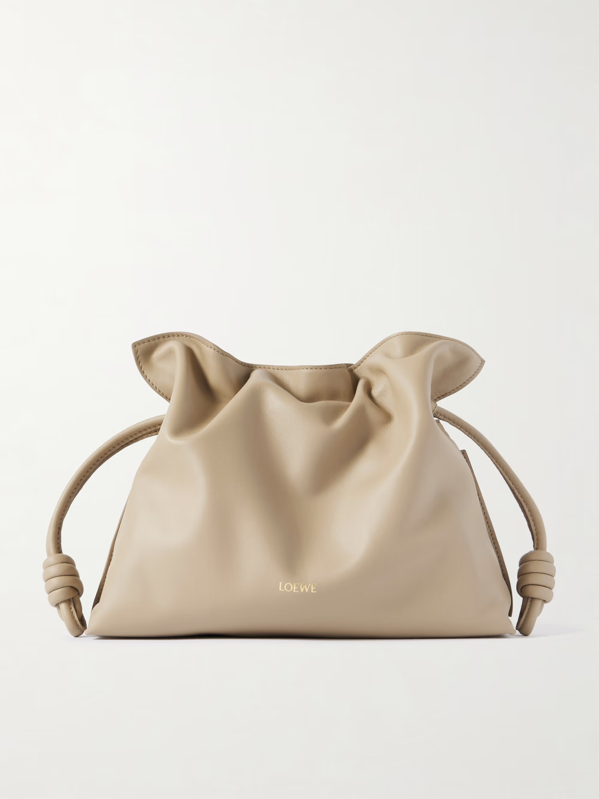 According to our buyers, slouchy bags are one of this season's most sought after styles, and Loew... | NET-A-PORTER (US)