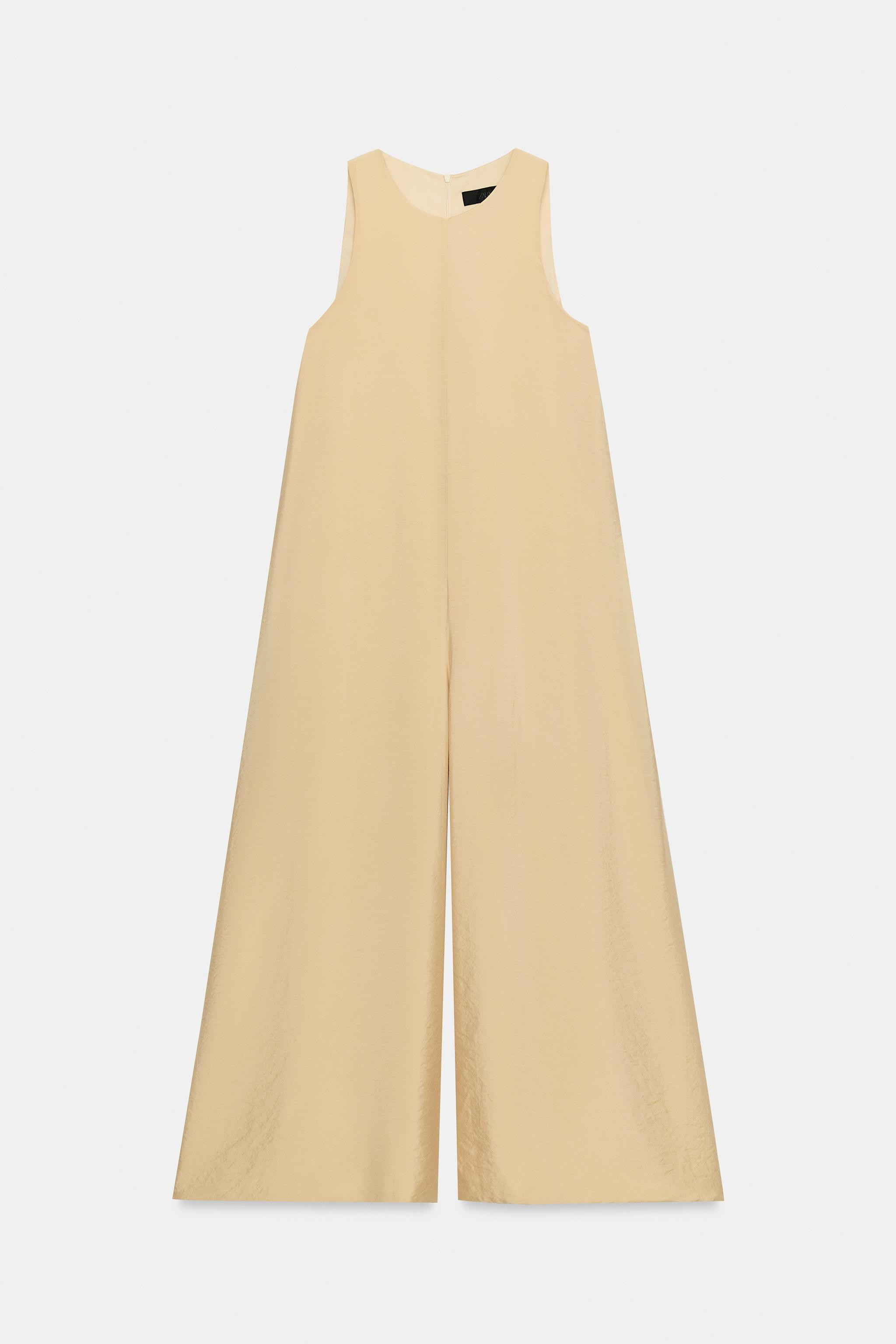 Round neck jumpsuit with sleeveless design. Featuring a very wide-leg cut, matching inner lining ... | Zara UK