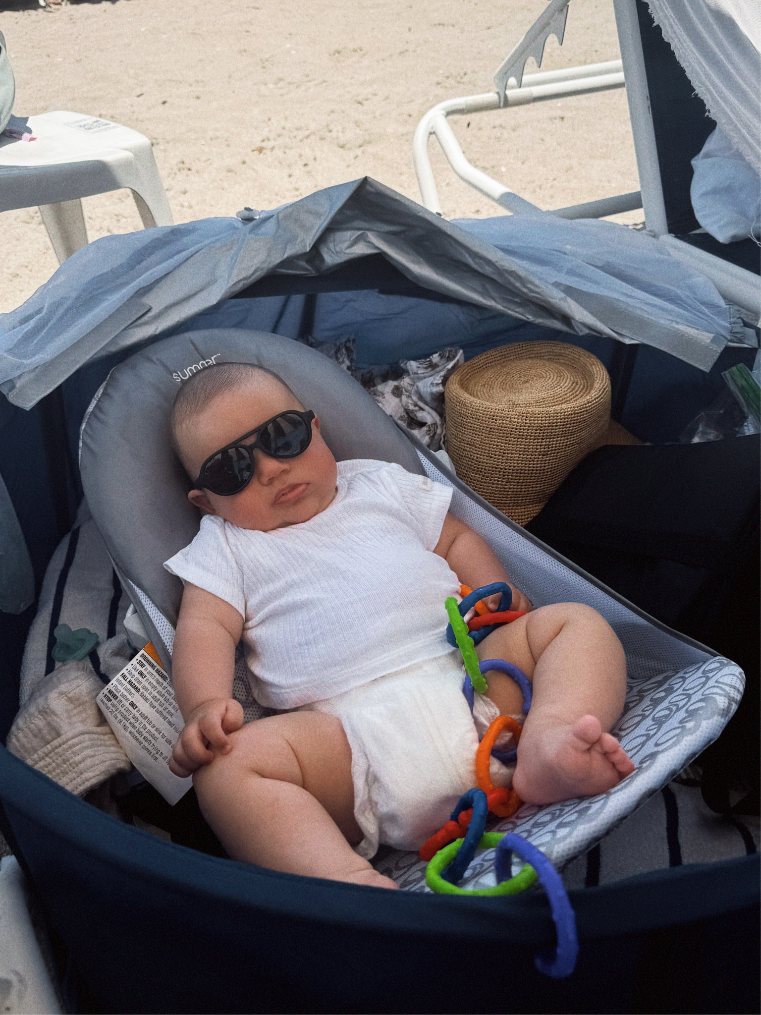 If you're traveling to the beach with a baby, do yourself a favor and GET THIS CHAIR!!! It doubles as a bath chair and a beach lounger and folds up nicely to fit in a carry-on or checked bag. The perfect beach baby hack! 😍

#LTKBaby #LTKSummerEdit #LTKTravel