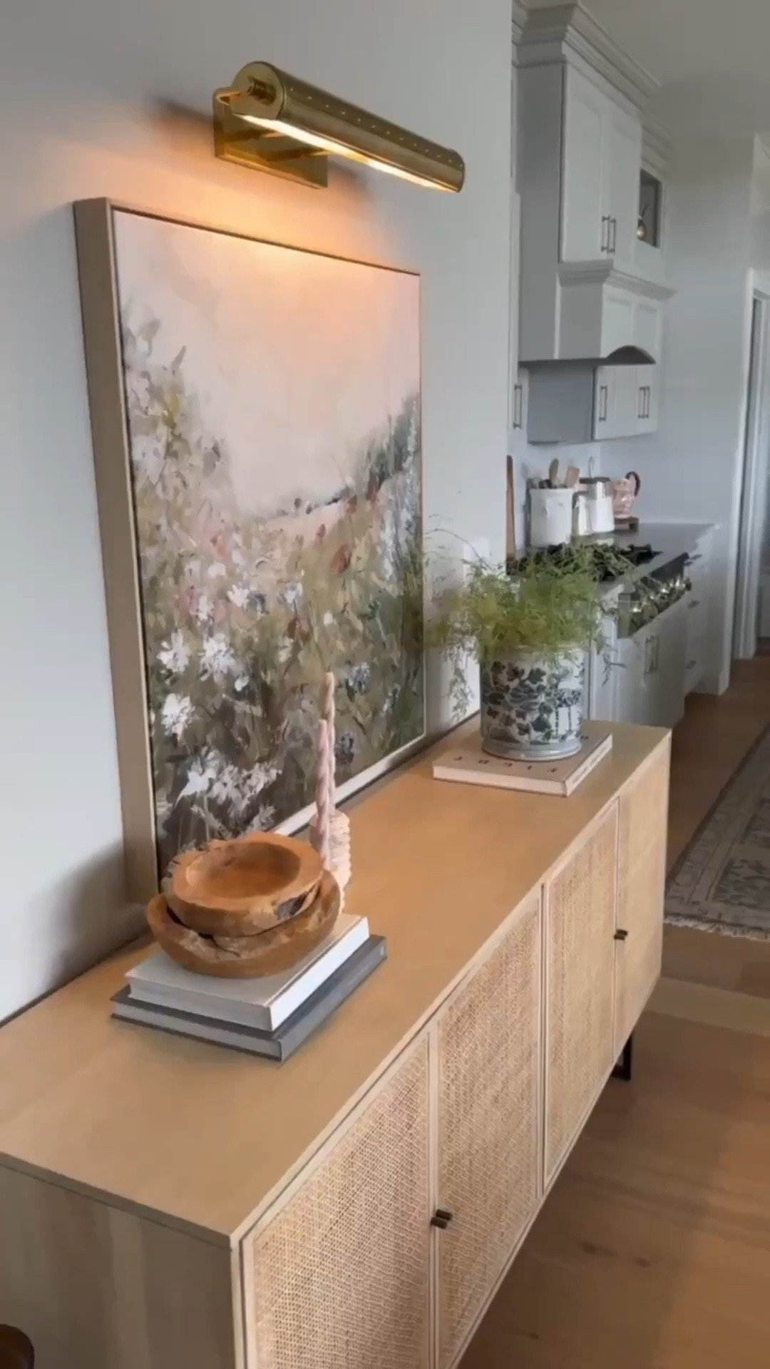 This picture light is just too good! It adds the prettiest ambiance to our living space, especially at night. The finish, size, and charm can’t be beat! Use code CINDYSPRING at Brooke & Lou to save!! 

#LTKHome #LTKSaleAlert