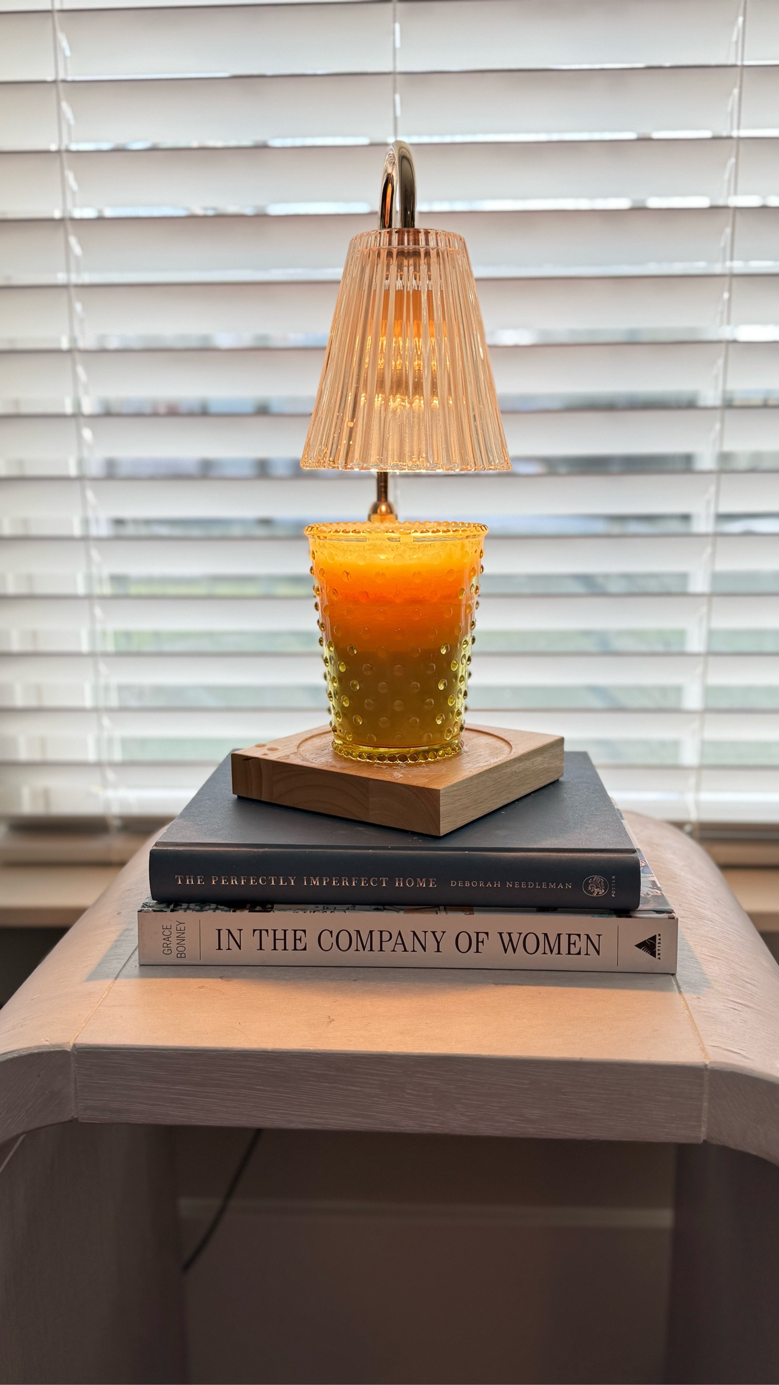 This candle warming lamp was the it gift last year, and I have used it every day! It lets you enjoy the smell of your favorite candle without the risk of a flame. It also provides the prettiest light and little accessory for a side table. This is a great gift for a gift exchange, a friend, your mom or the hostess!

#LTKGiftGuide #LTKHome #LTKFindsUnder50