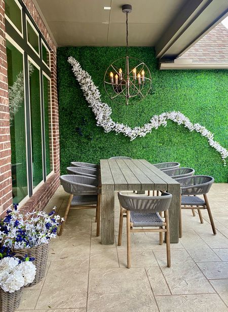 Still a work in progress but so happy not to stare at a red brick wall in our patio anymore! 

#topiary wall
#outdoor design
#outdoor dining
#patio decor

#LTKhome
