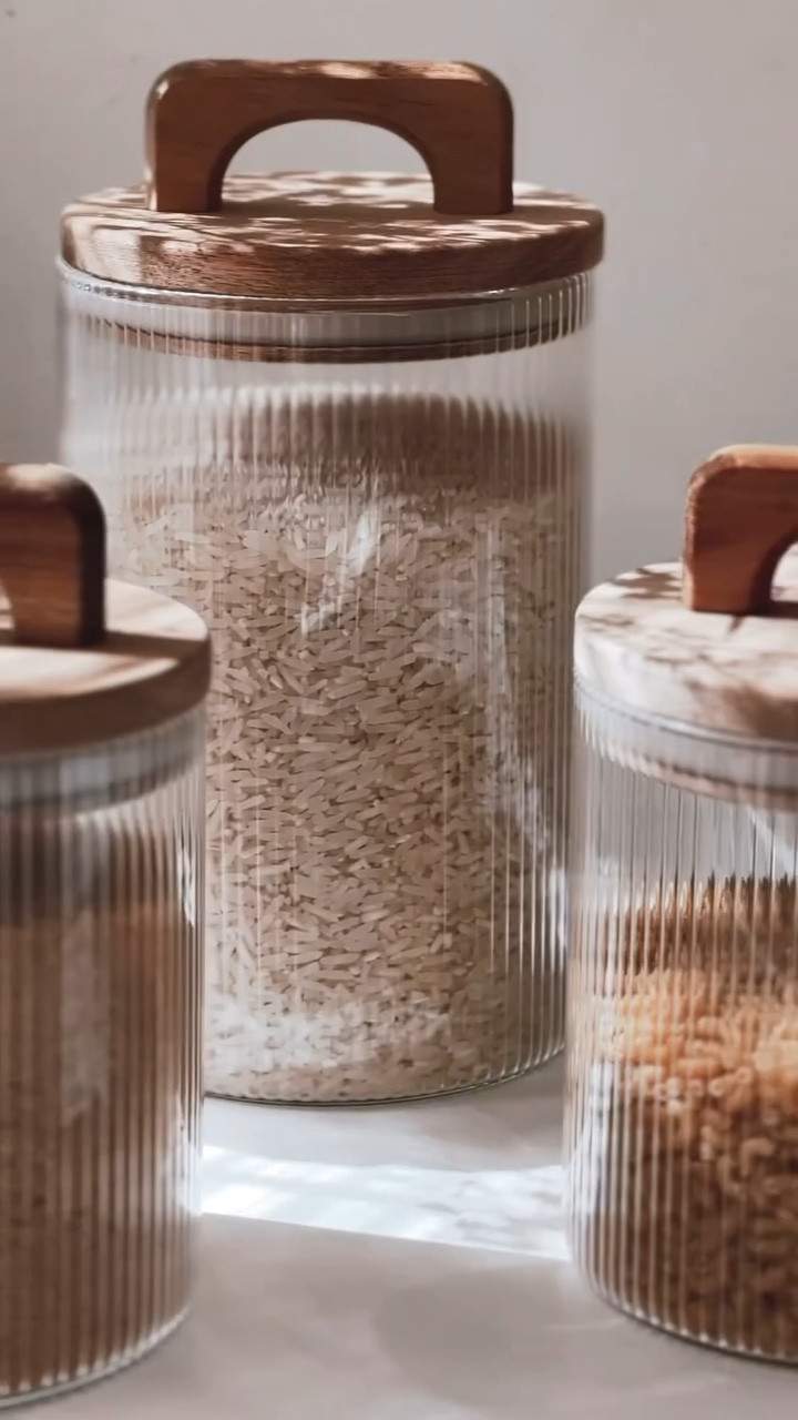 Obsessed with these Bernal Canisters! ✨ They're the perfect way to keep my pantry organized and looking chic. The ribbed glass and warm wood lids add a touch of understated elegance to my kitchen. I love how they display my everyday essentials in a beautiful way. Shop this set and other kitchen favorites on my LTK! #LTKStyle #kitchenorganization #pantryorganization #canisters #kitchenstorage #homedecor #interiordesign #kitchendesign #homeinspo #interiorstyling #cozykitchen #glasscanisters #woodenlids #bernalkanisters

#LTKActive #LTKSeasonal #LTKHome