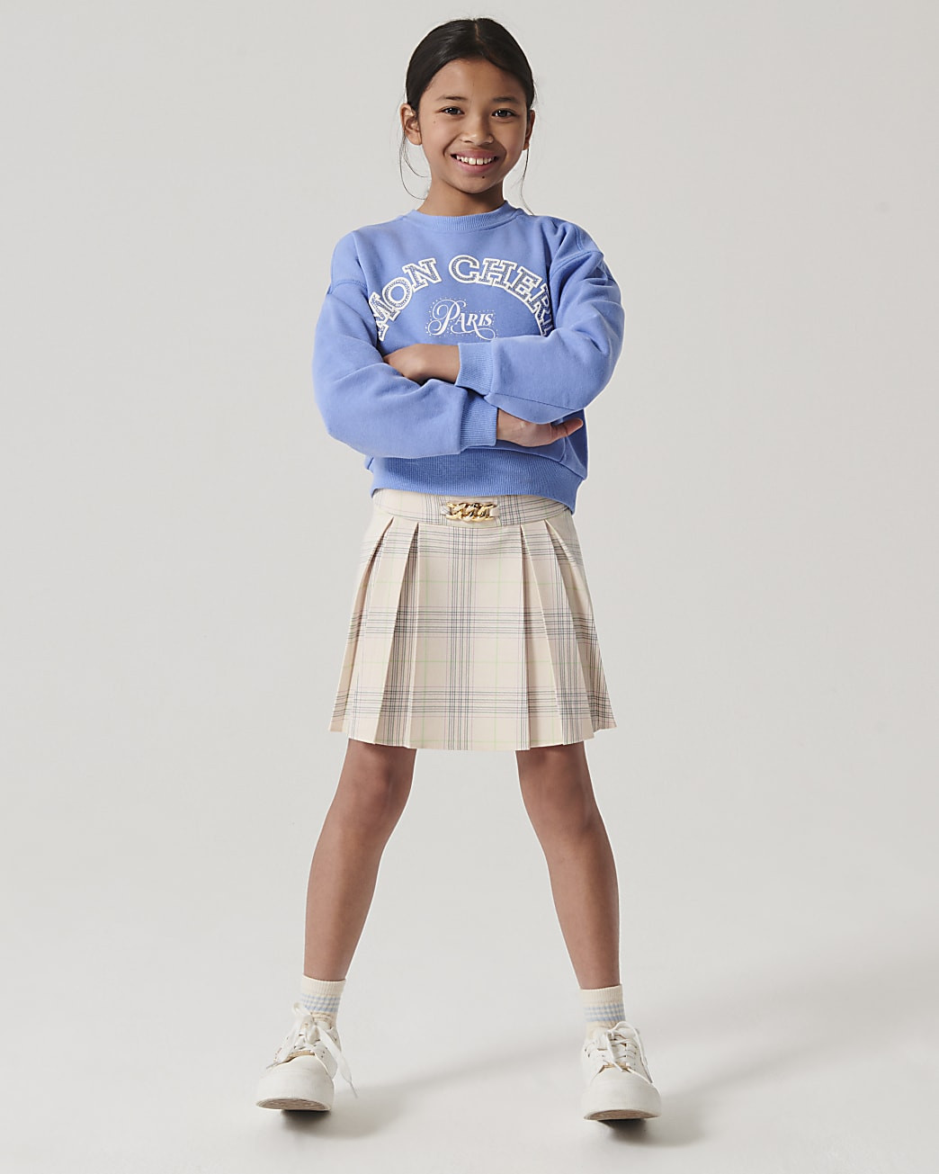 Girls cream check pleated skirt | River Island (UK & IE)