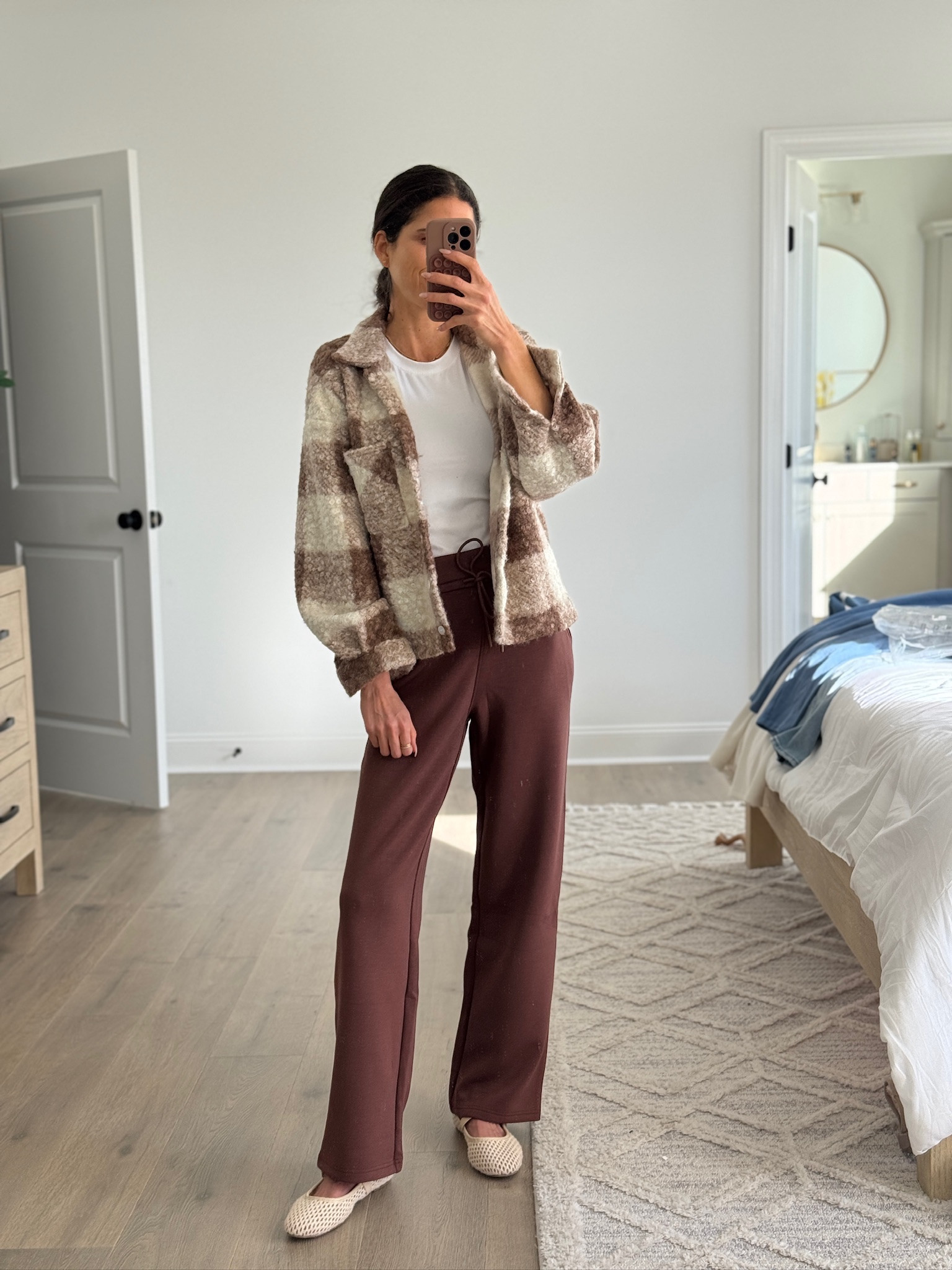 An easy, comfortable outfit that still feels put together. I love pairing a simple white tee with wide leg pants and a lightweight jacket for an everyday look that works for errands, school days, or casual plans. The neutral tones make everything easy to mix and match, and these are pieces I reach for again and again. Perfect for layering as the seasons change.

#LTKSeasonal #LTKootd #LTKgrwm