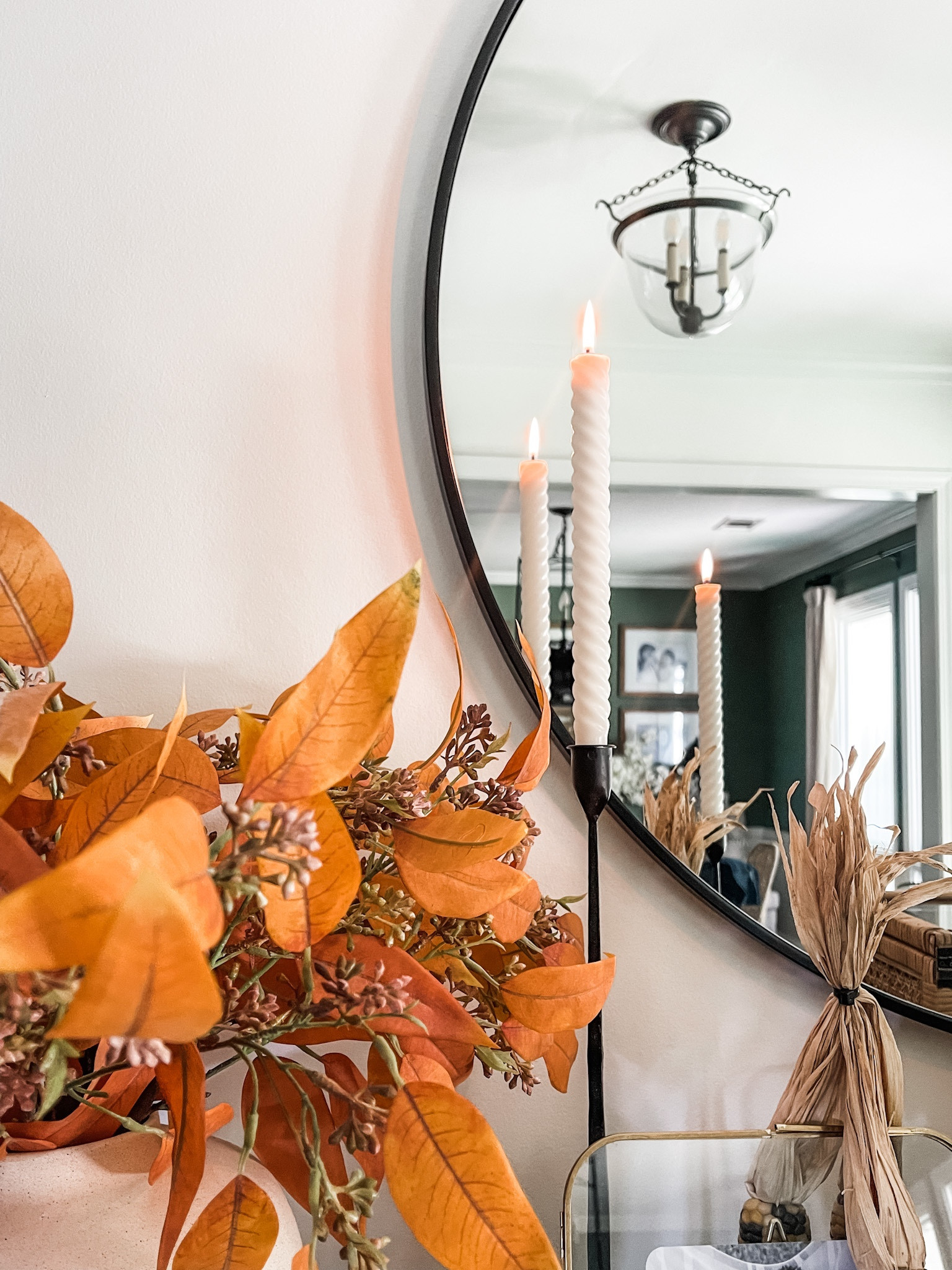 Dreamy fall foyer 🍁

#falldecor #fallstyling #fallhomedecor #candlestick #candle #foyer #fauxflorals #roundmirror #eucalyptus 

#LTKSeasonal #LTKhome #LTKstyletip