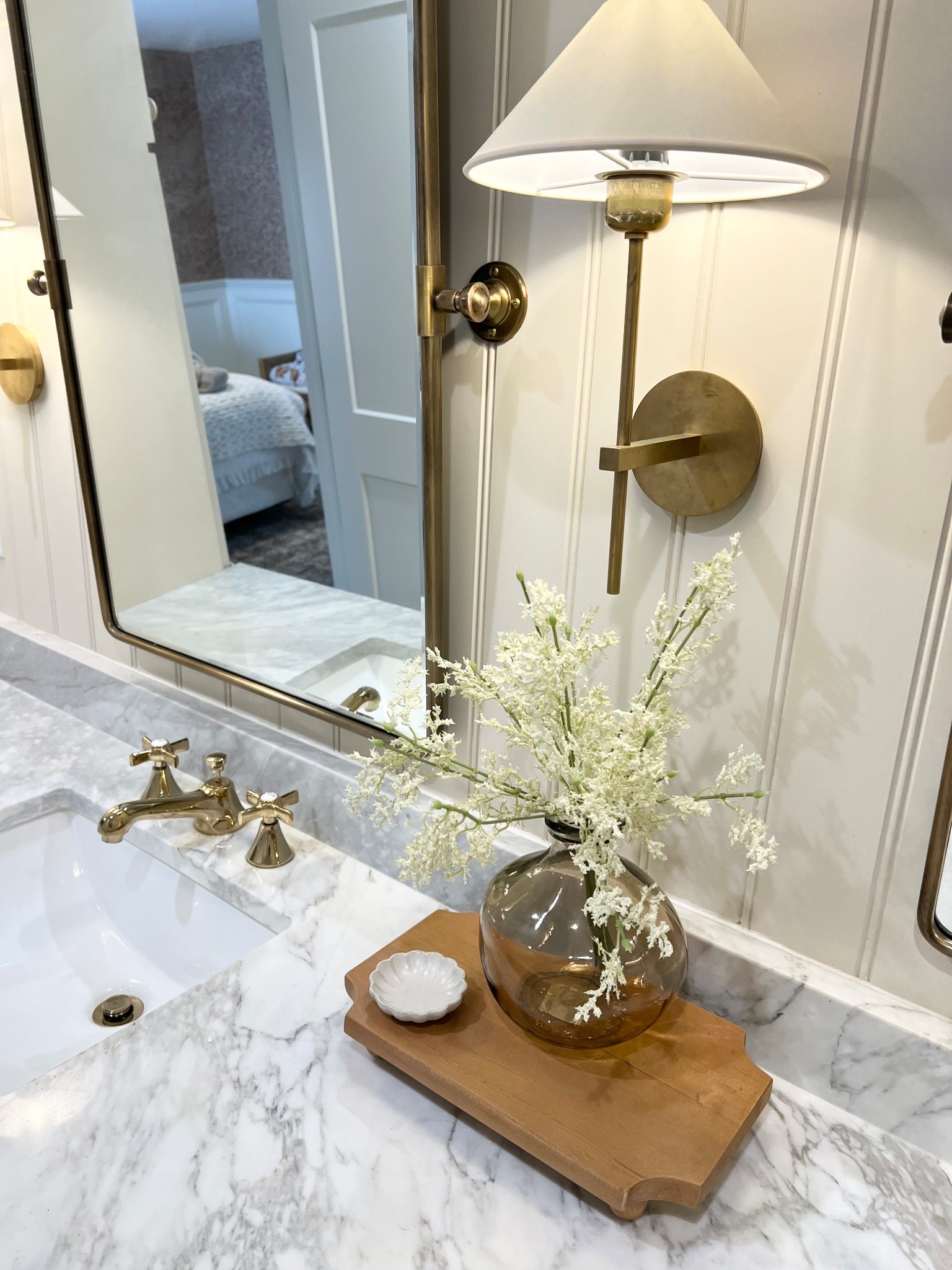 Girls bathroom inspo. Marble. McGee and co home accent. Amber interior vibe. Brass wall sconce. Pottery barn wall mirror. Kingston brass faucet. Affordable hardware. Target home finds. Magnolia home. Fresh finds  

#LTKSaleAlert #LTKHome #LTKFindsUnder100