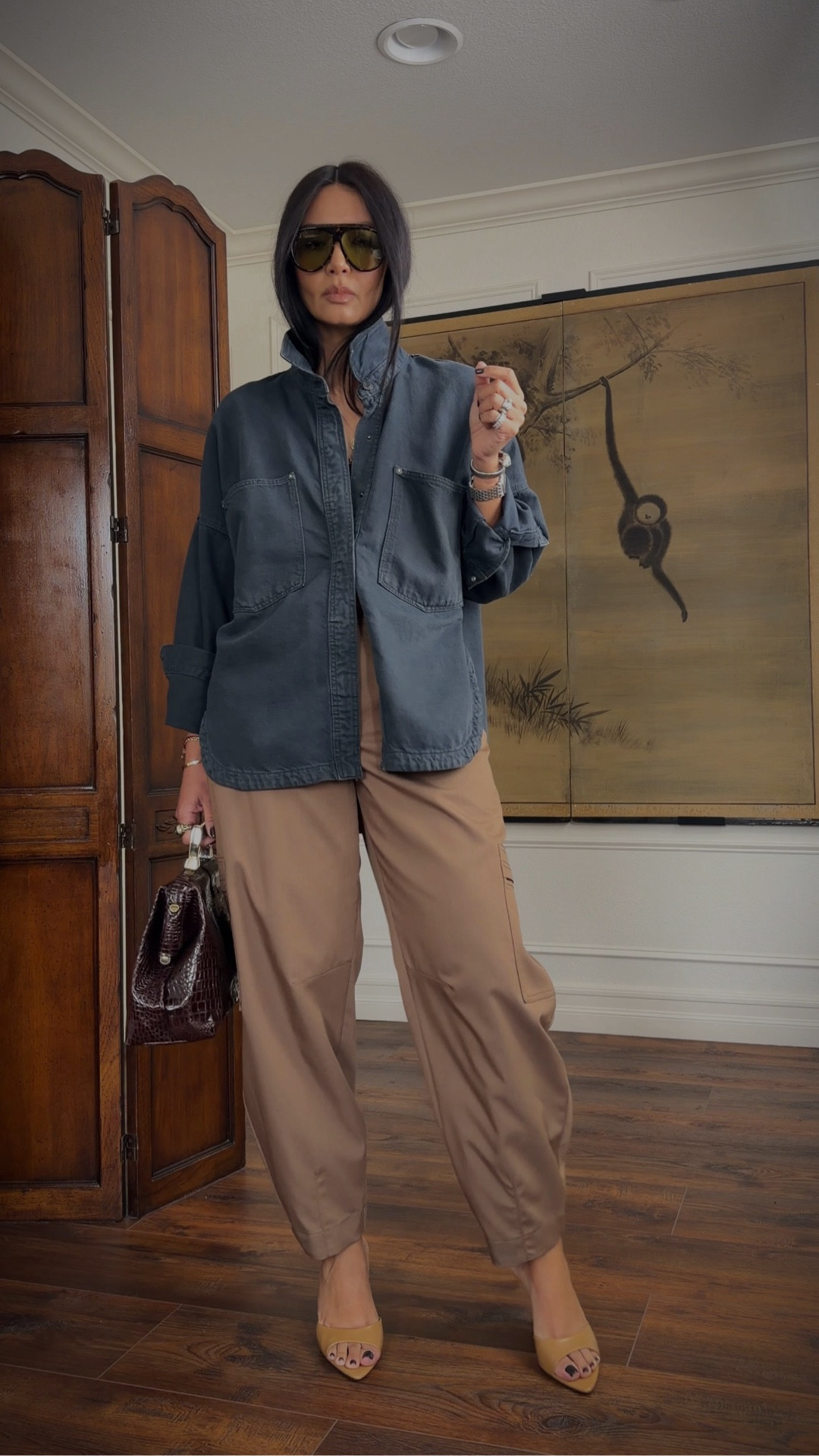 I usually take a medium in Zara, but I sized up on these pants for that relaxed, flowy fit. The shirt is an old Zara find (I found one on eBay and linked current similars styles below). Shoes are old from Mango, bag is a vintage find. 5’7” for height reference! 