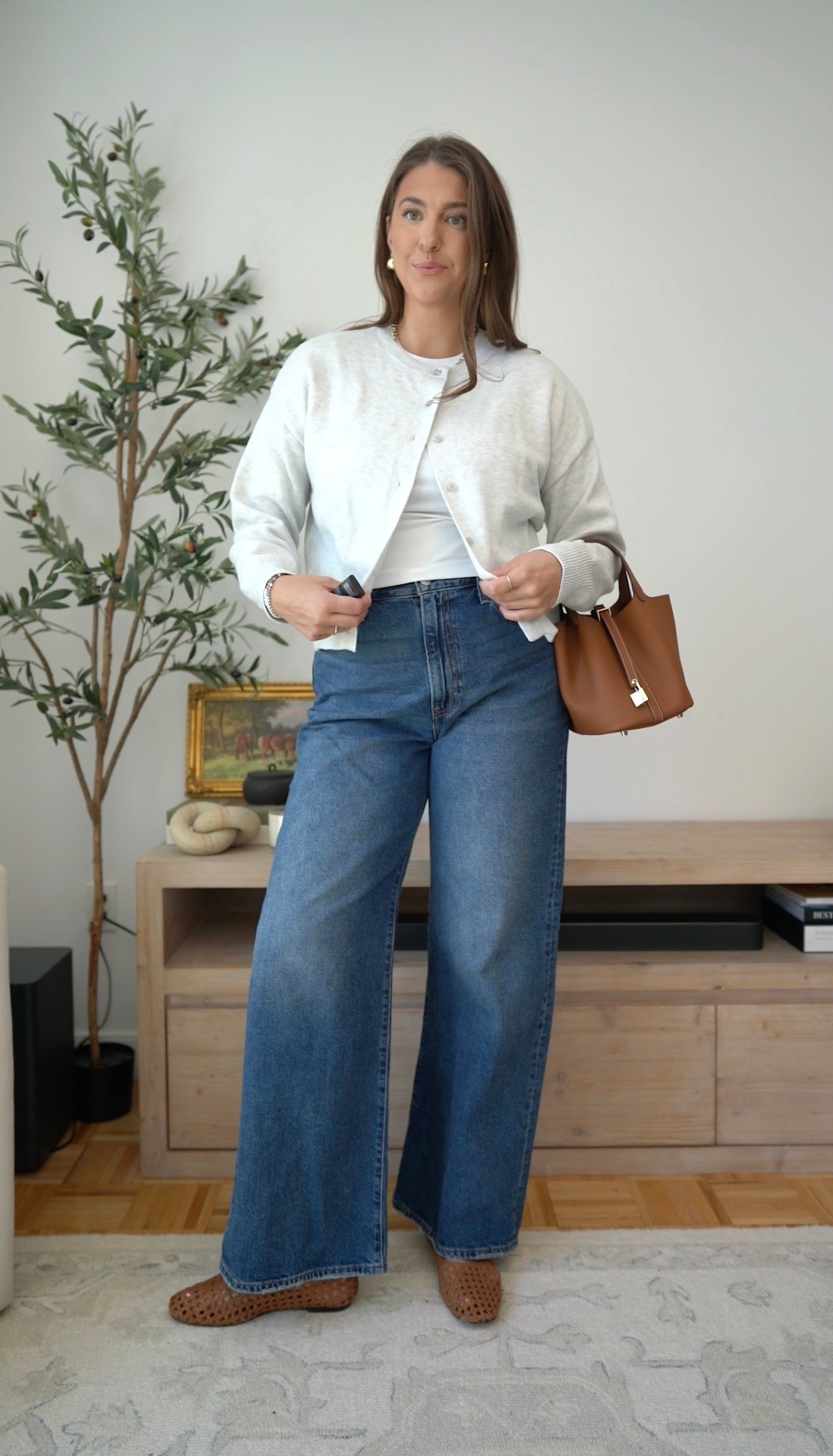A simple fall outfit that feels polished but still easy 🤎 Wide-leg denim, a soft neutral cardigan, woven flats and a warm brown tote make the perfect everyday transition look. Size large, size 14 | runs tts 

fall outfit, wide leg jeans, cardigan outfit, neutral fall style, woven flats, brown tote, everyday fall fashion, size 14 jeans

#LTKMidsize #LTKSeasonal #LTKWorkwear