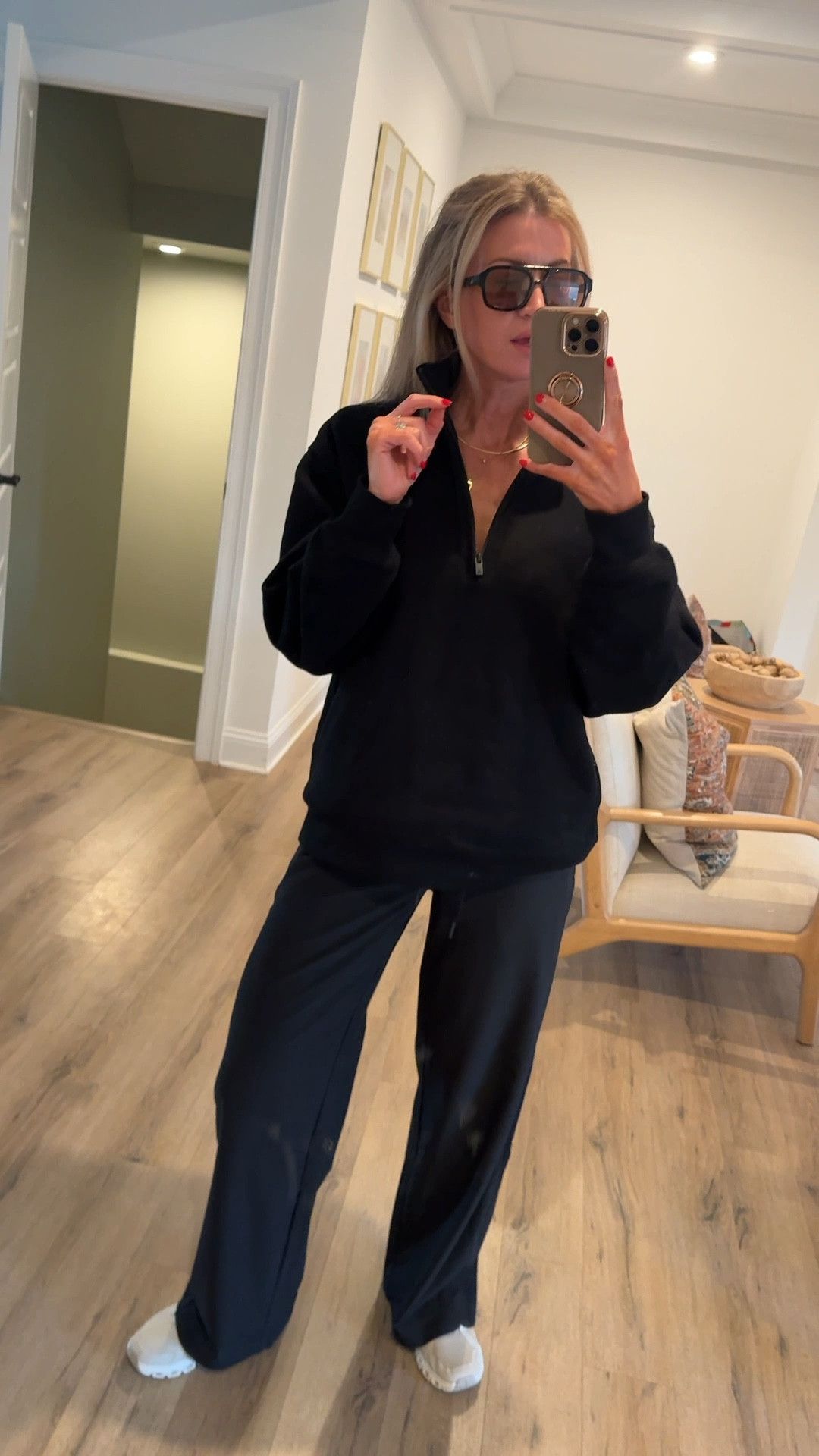 Love this all black look for a night walk. 
Black half zip sweatshirt: this is my picky Girl sweatshirt, just with no hood and a half zip. Wearing a small, runs slightly oversized.
Wide leg active pants: FANTASTIC. So well designed. Runs TTS, wearing a S.
Running shoes: runs TTs 
