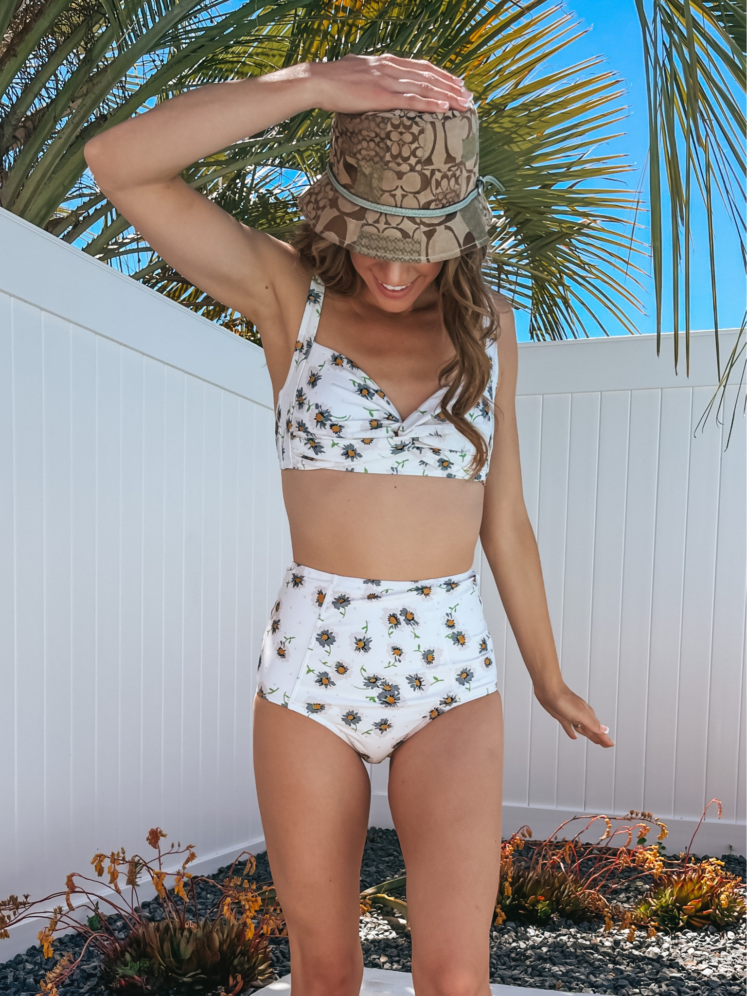 Tip toeing to summer days.
Daisy swimsuit and bucket hat please!

www.LivingBarelyBlonde.com
#twopieceswimsuit #highriseswimsuit #vacationwear #buckethat #momswimsuit #swimwear #womensswimsuit #floralswimsuit #floralprint #summeroutfit #summerwear #barelyblonde #treasures #kristahor #cmcovi #daniaus 

#LTKswim #LTKFind #LTKtravel