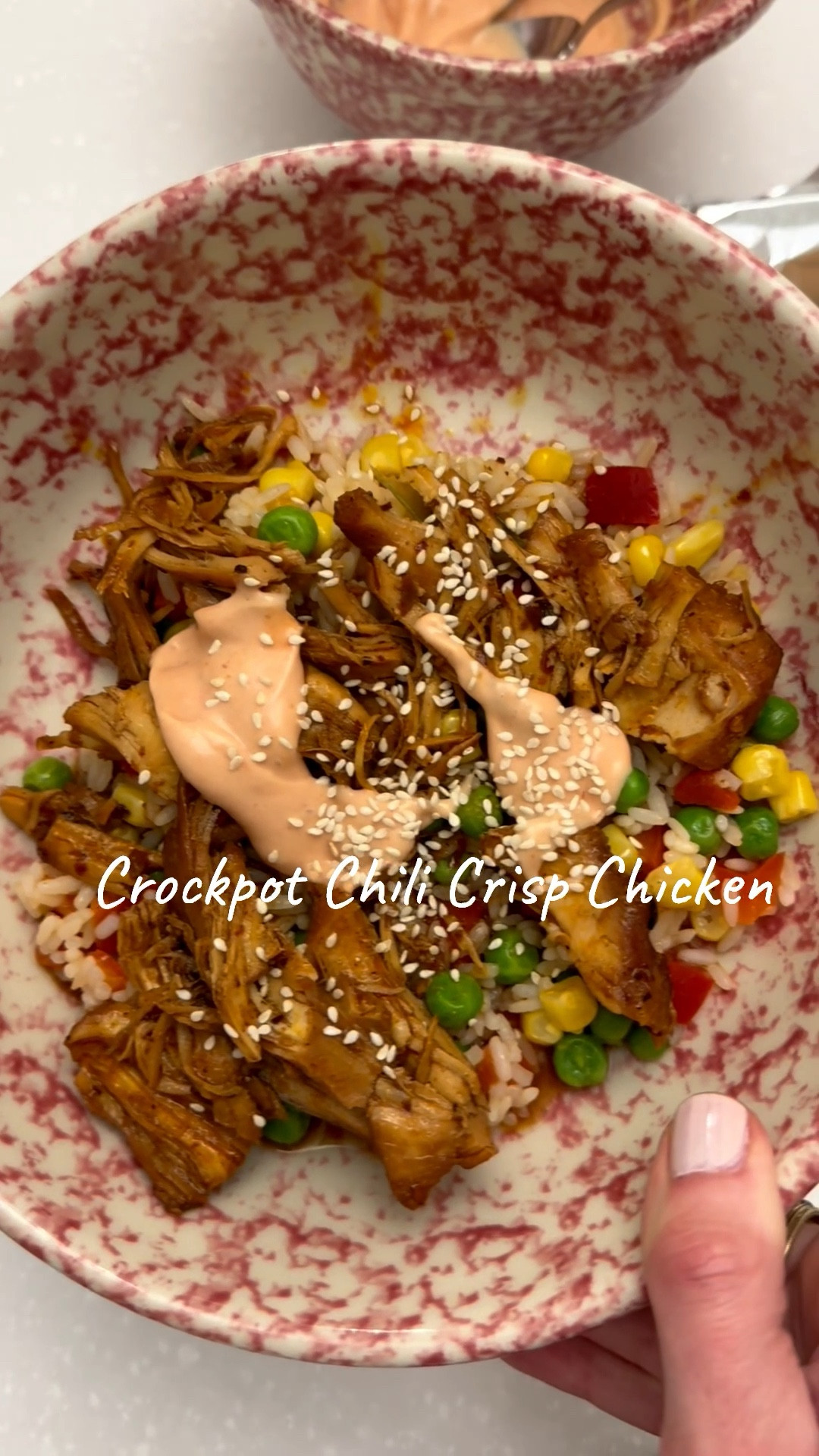 Crockpot meal, high protein cooking, crockpot recipe 

Slow Cooked Chili Crisp Chicken:
1360g (48oz) chicken breast
100g (/ Tbsp) chill crisp
80g (4 Tbsp) honey
60g (4 Tbsp) soy sauce
30g (2 Tbsp) sriracha
Salt, pepper, and garlic powder, to taste
High: 3-4 hours
OR
Low: 4-5 hours

Add After Cooking:
30g (2 Tbsp) seasoned rice vinegar
2 green onions, chopped Sesame seeds, to taste
Rice
480g (2½ cups) short grain or sushi rice
720g (3 cups) chicken bone broth
Low Calorie Spicy Mayo
50g (3 Tbsp) low-fat mayonnaise
150g (⅔ cup) 0% Greek yogurt
70g (4 Tbsp) sriracha
30g (2 Tbsp) no-sugar ketchup
Salt, pepper, garlic powder, to taste Milk, as needed for desired consistency
Instructions
1.) Place chicken breasts in a slow cooker. Add chili crisp, soy sauce, sriracha, honey, and a pinch of salt, pepper, and garlic powder. Stir gently to coat the chicken.
2.) Cover and cook on high for 3-4 hours or low for 4-5 hours.
3.) While the chicken finishes, combine rice with bone broth.
Bring to a boil, then cover and reduce to a low simmer. Cook for 15-18 minutes, then let rest for 5 minutes before fluffing with a fork.
4.) Shred the cooked chicken directly in the slow cooker using two forks. Stir in rice vinegar, green onions, sesame seeds.

#LTKdayinmylife #LTKHome #LTKfoodie