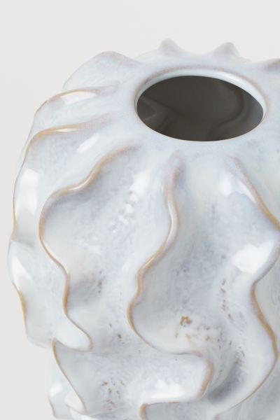 Tall, coral-shaped vase in glazed stoneware with a wavy surface. Appearance of glaze varies from ... | H&M (US + CA)