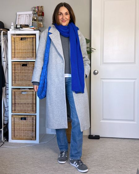 Pops of blue! I have this scarf in some many colors, it’s so soft and stretchy! The bag is such a fun style and also comes in several colors. 
Sized up one size to M in my fave white tee (it’s a slim fit) and in the crew neck sweater for more sleeve length.
The wool coat is pricy but such great quality, I have it in two colors. I’m 5’ 7 wearing my usual size S, it’s a roomy fit.
Wearing my usual size 27 in these straight leg jeans.
Adidas Gazelles fit big, I went down 1/2 size (go down 1.5 sizes if it’s mens sizes)


#LTKitbag #LTKstyletip #LTKshoecrush