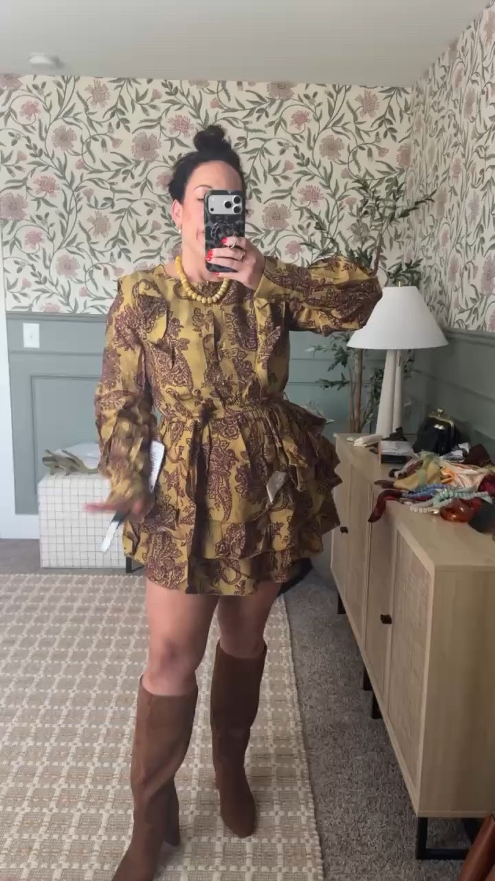 I love everything about this dress, from the pretty pattern to the tiered skirt. It makes such a statement while still being easy to style. I especially love the way it looks paired with tall boots for fall.

#LTKSeasonal #LTKMidsize #LTKootd