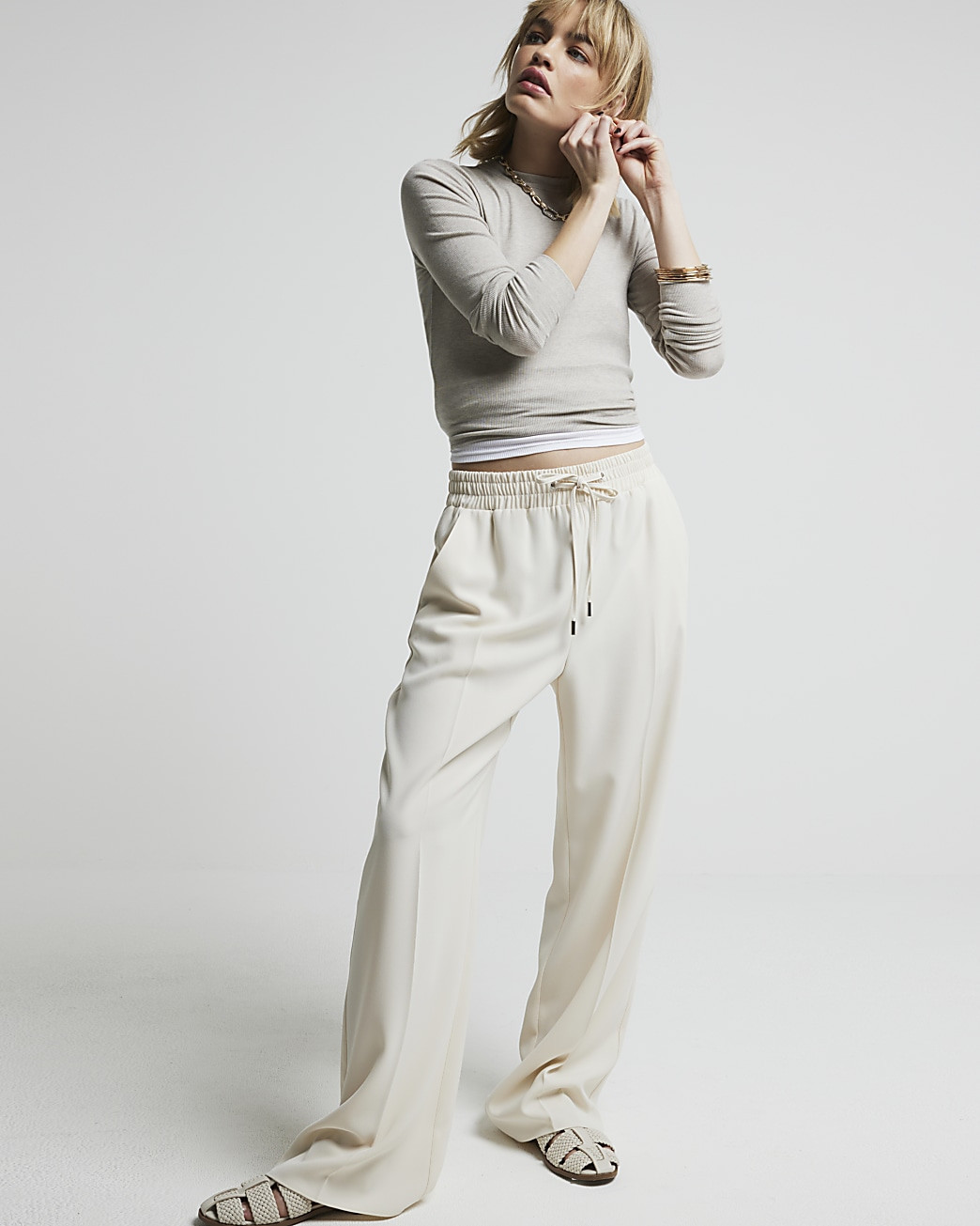 Cream wide leg jogger trousers | River Island (UK & IE)
