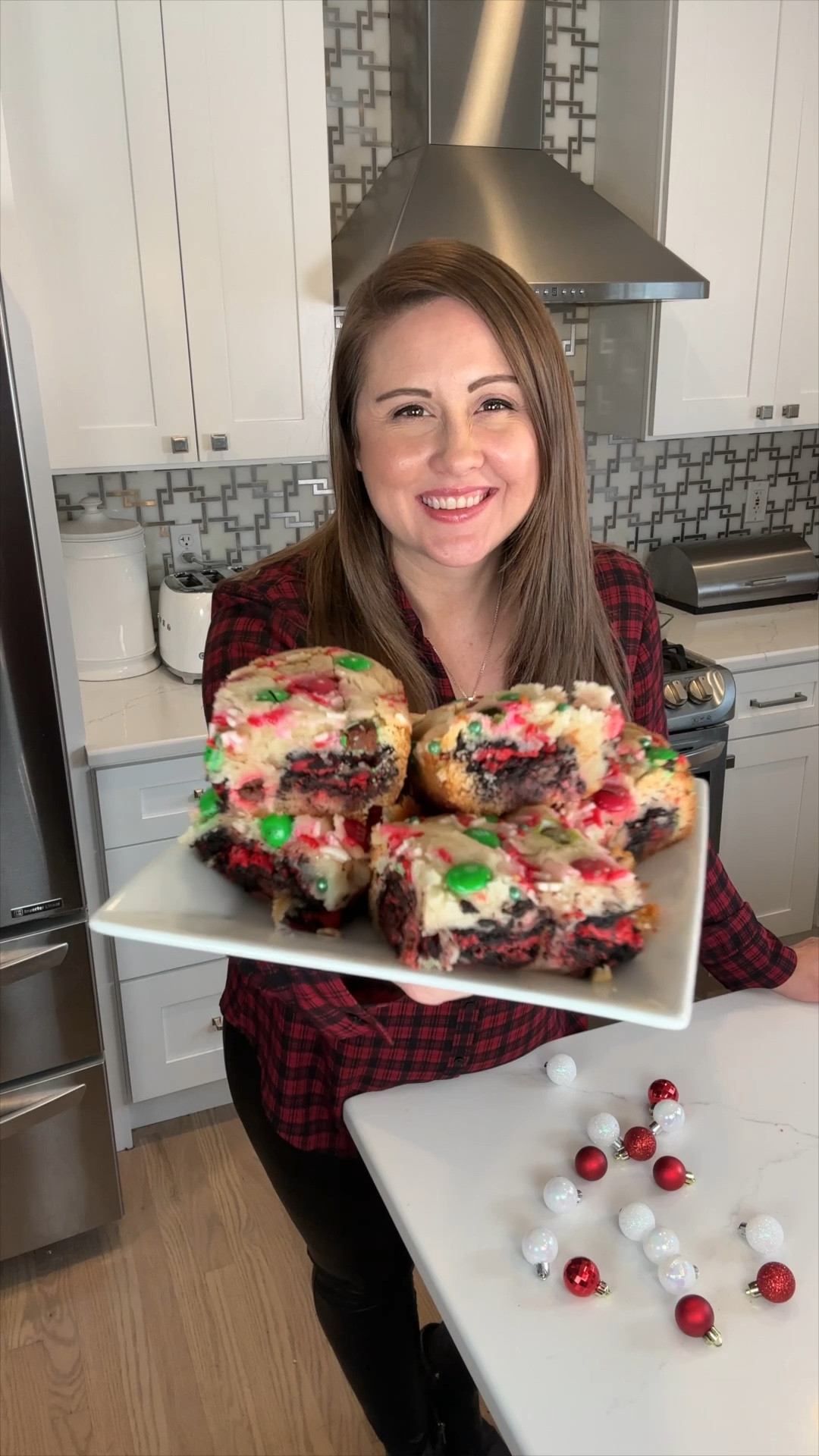 This layered holiday dessert is a must-try! 🎄✨ Start with a layer of sugar cookie dough, add festive M&Ms and sprinkles, then a layer of holiday Oreos. Top it off with another layer of cookie dough, M&Ms, and sprinkles for the ultimate treat! So easy, so festive, and absolutely delicious. Perfect for holiday parties or cozy nights in! 🍪❤️ #HolidayDesserts #LayeredTreats #FestiveBaking #HolidayCookies #ChristmasBaking 

#LTKHoliday #LTKFamily #LTKHome