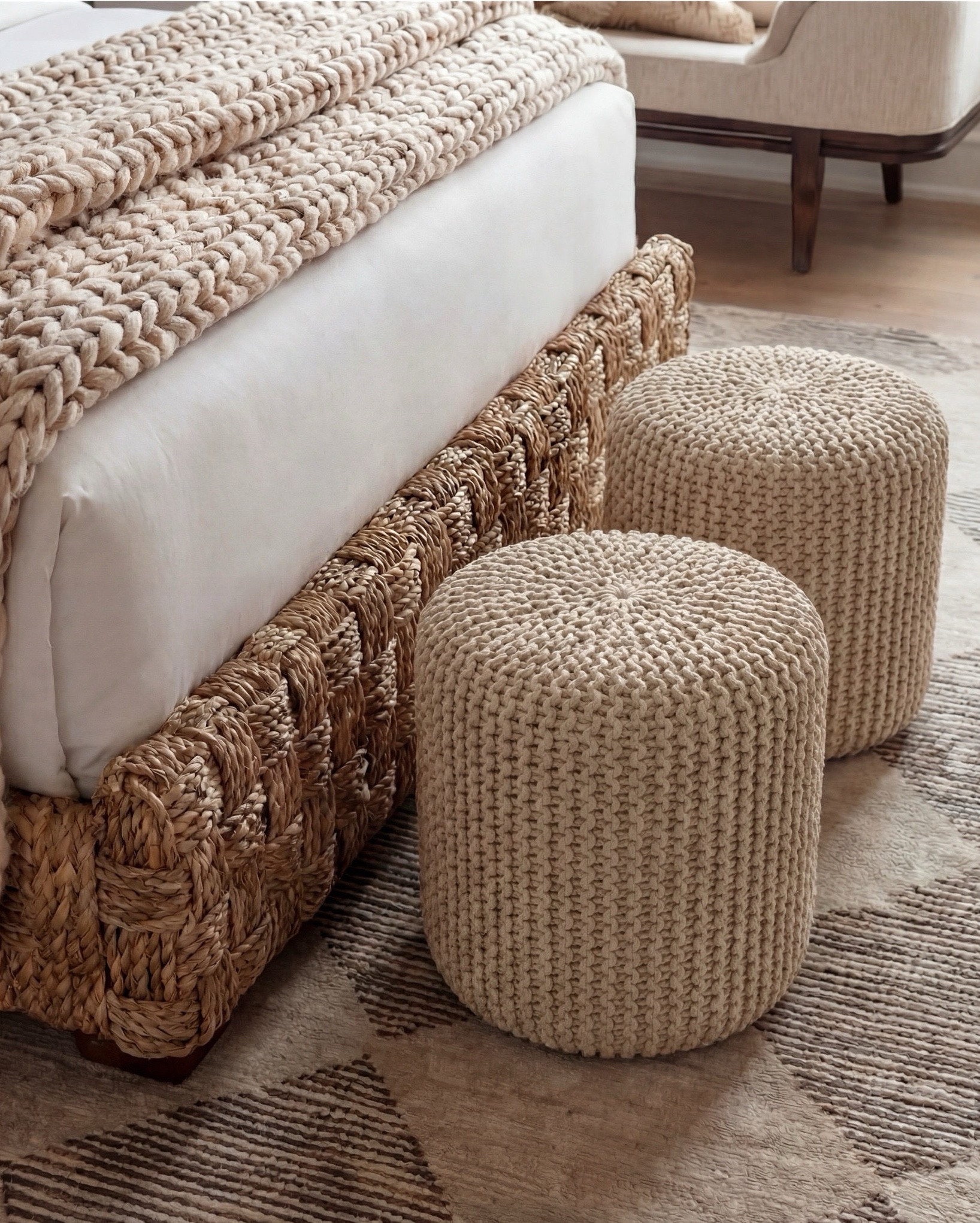 Shop the Look:
• Wood Woven rattan bed frame
• White upholstered mattress or box spring
• Black wood 3-drawer nightstands (set of 2)
• White duvet cover (hotel-style)
• White fitted sheet + pillow set
• Chunky knit throw blanket (beige or oatmeal)
• Neutral patterned accent pillow
• Brass globe wall sconces
• Cream ceramic table lamp with beige shade
• Large abstract landscape wall art (neutral tones)
•brown floral wall art
• Gold irregular curved scalloped wall mirrors
• Round woven knit poufs
• Neutral geometric or diamond area rug
• Large white ceramic vase
• Small decorative bowl (white or stone)
• Ivory linen curtain panels
•wood upholstered accent chair 
•black terracotta vase
•wood rattan dresser
•brass decor tray
•black leaf decor bowl 
•decor books

#LTKsale #LTKhome #LTKstyletip