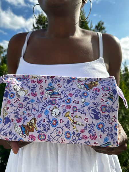 Disney Cosmetic carry bag. Gorgeous Belle Floral print perfect for vacation and cosmetic essentials. M 

#LTKbeauty #LTKitbag #LTKtravel