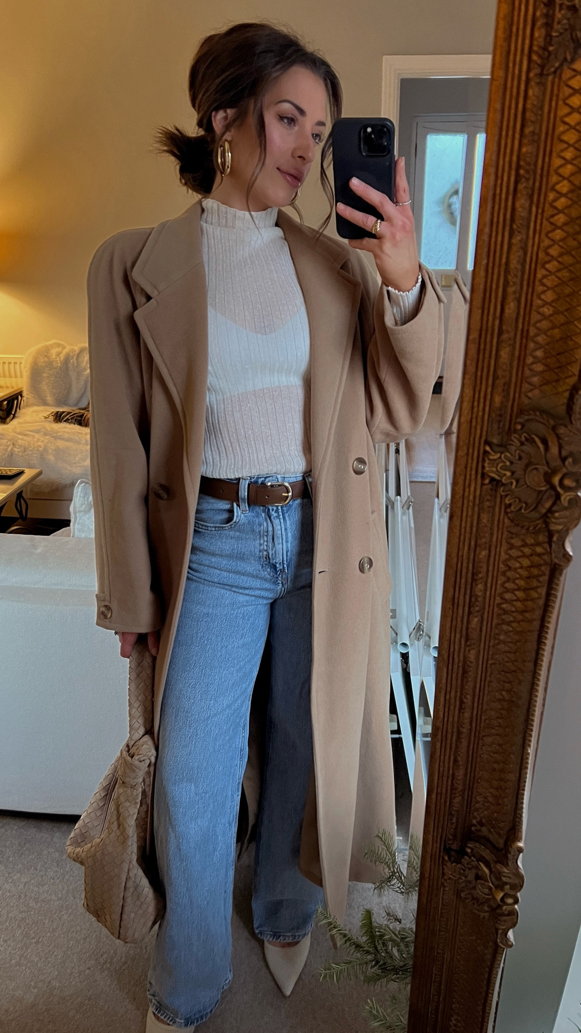Winter date night outfit. OOTN. European style. Camel peacoat. Suede woven shoulder bag. High waisted light wash denim. Outfit inspo. Winter outfit inspo. Winter style. 

#LTKFindsUnder50 #LTKFindsUnder100 #LTKItBag