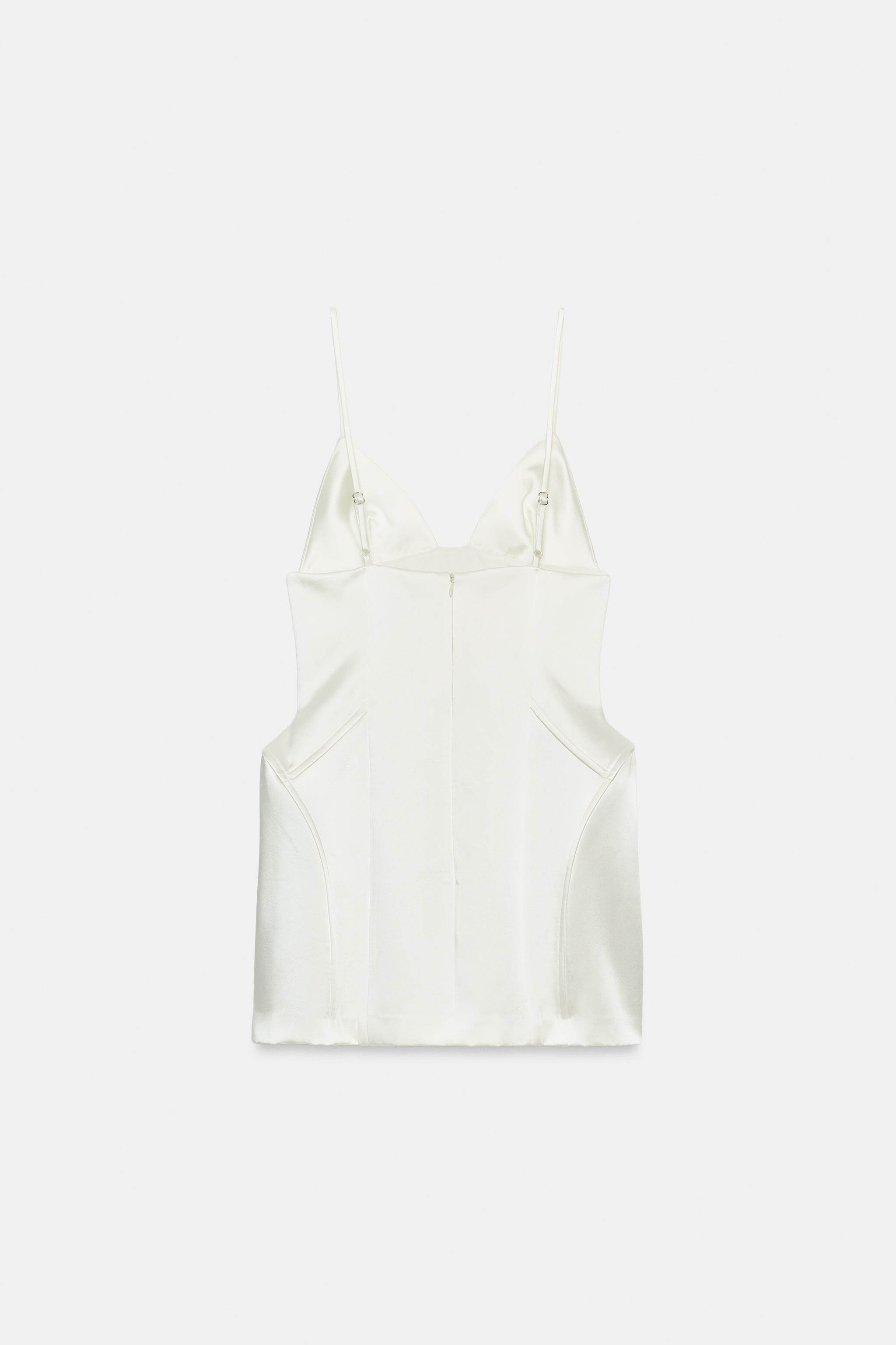 Mini dress with V-neckline and adjustable spaghetti straps. Metal boning. Matching inner lining. ... | Zara US