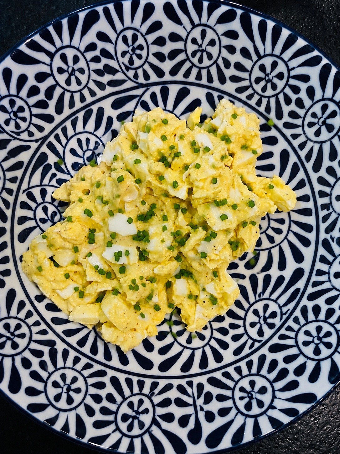 Creamy Greek Yogurt Egg Salad 🥚

Ingredients

* 6 hard-boiled eggs, chopped
* ¼ cup plain Greek yogurt
* 1 squeeze Dijon mustard
* 1 squeeze yellow mustard
* Sprinkle of paprika
* Salt & pepper, to taste
* 1–2 teaspoons dried chives or 1 tablespoon fresh chives, chopped

Instructions

1. Chop the hard-boiled eggs and place them in a mixing bowl.
2. Add the Greek yogurt, Dijon mustard, and yellow mustard.
3. Sprinkle in paprika, chives, salt, and pepper.
4. Stir until everything is well combined and creamy.
5. Taste and adjust seasonings as needed.
6. Serve immediately or chill for 30 minutes for even better flavor.

Serving Ideas

* Over mixed greens
* In lettuce wraps
* On toasted sourdough
* With cucumber slices or crackers

Approximate Nutrition (entire recipe)

* Calories: ~500
* Protein: ~42g
* Carbs: ~5g
* Fat: ~33g

Per serving (½ recipe):

* Calories: ~250
* Protein: ~21g
* Carbs: ~2–3g
* Fat: ~16g

A sprinkle of fresh chives on top adds a pretty finish and a mild onion flavor. 🌿🥚

#LTKfoodie #LTKHome #LTKfitnessgoals