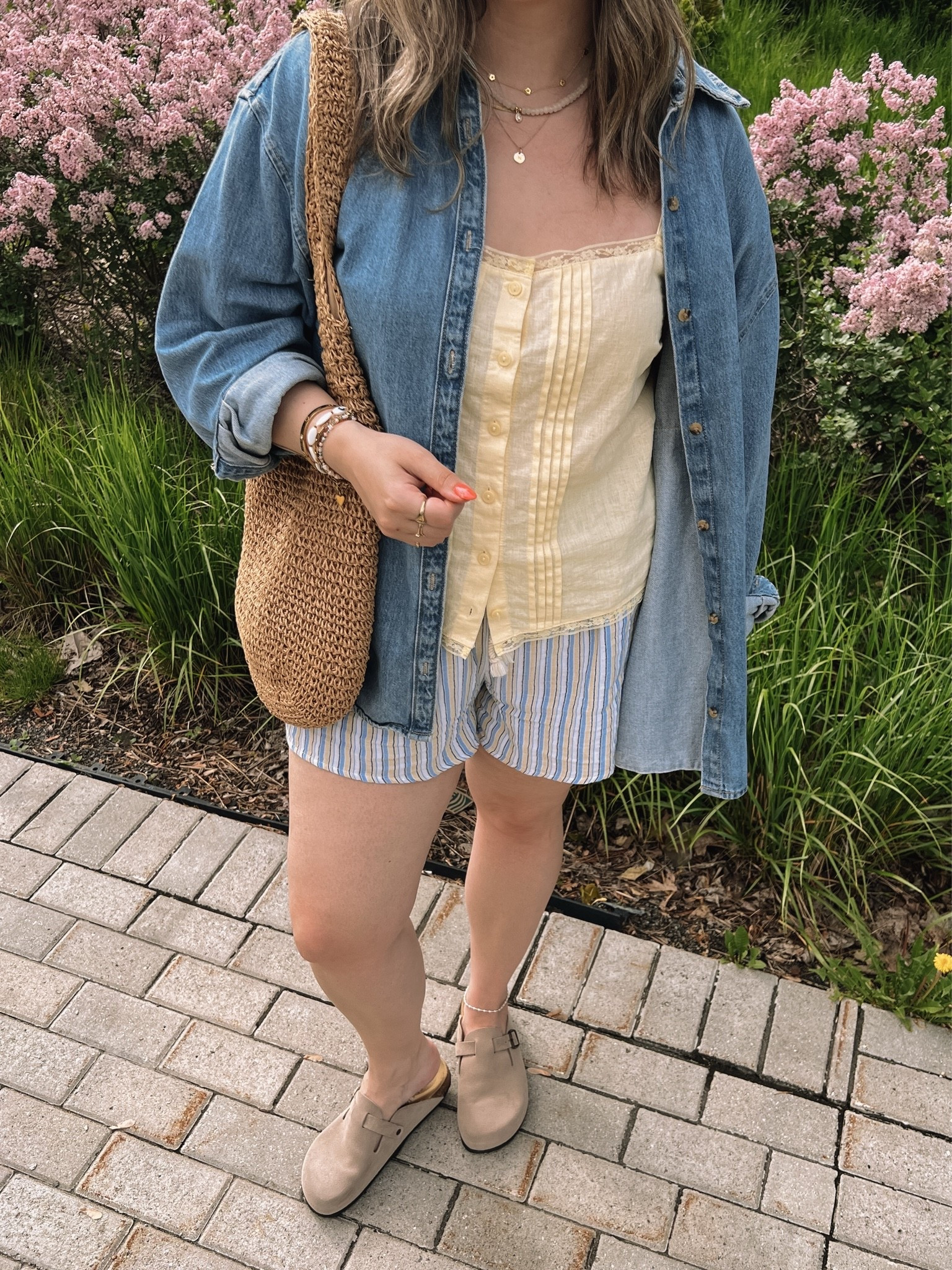 Easy summer outfit! Canadian links are under “similar products”. Wearing my usual size L in the striped shorts, butter yellow tank top, and oversized denim shirt. Straw tote bag is one of my fave Amazon finds! Linked similar clogs

#LTKsummer #LTKmidsize #LTKstyletip