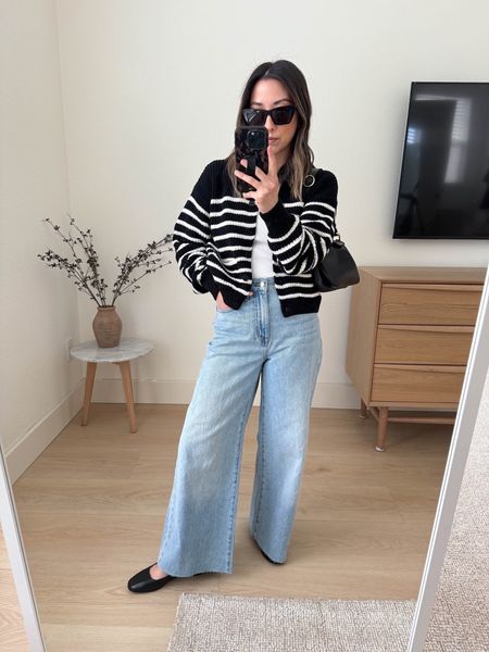 Latest from Madewell. Super soft super wide leg jeans. Run tts but Im going to size up. Cut the hems on these. Rise isn’t super high. Cardigan on sale!

Madewell cardigan xs. Need the small
Madewell tank small. I sized up. 
Madewell jeans 24. Want the 25
Madewell flats 5
Madewell bag
YSL sunglasses  

Spring outfits, jeans, petite style 

#LTKsalealert #LTKfindsunder100 #LTKitbag