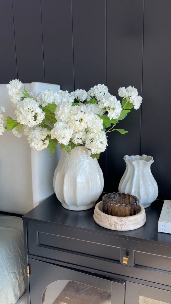 These faux hydrangea stems add the perfect soft, lived-in touch to our bedroom, and…