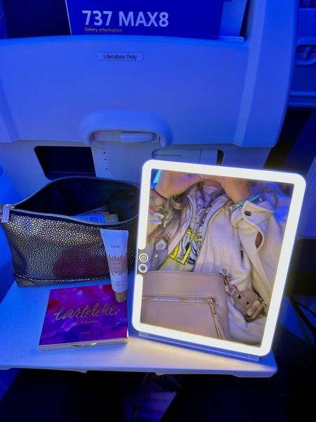 LED lighted mirror was perfect to out my makeup on on the airplane 💡 

#LTKtravel #LTKFestival #LTKbeauty