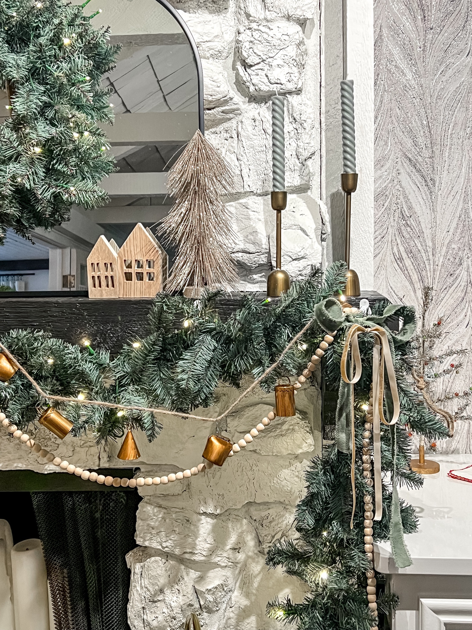 3 easy mantle decorations! My favorite Christmas decorations to add to any mantle are hand tied bows, dehydrated oranges, and mini bells!  Plus my King of Christmas garland set is on sale! 

#LTKhome #LTKHoliday #LTKfindsunder50