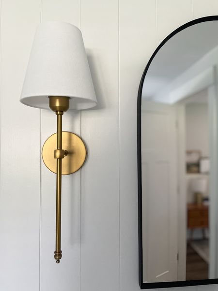 These sconces are so pretty and affordable from Amazon.  

Gold sconce.  Modern sconce.  Black arched mirror.  Bathroom lighting.  Bathroom mirror.  

#LTKfindsunder100 #LTKstyletip #LTKhome
